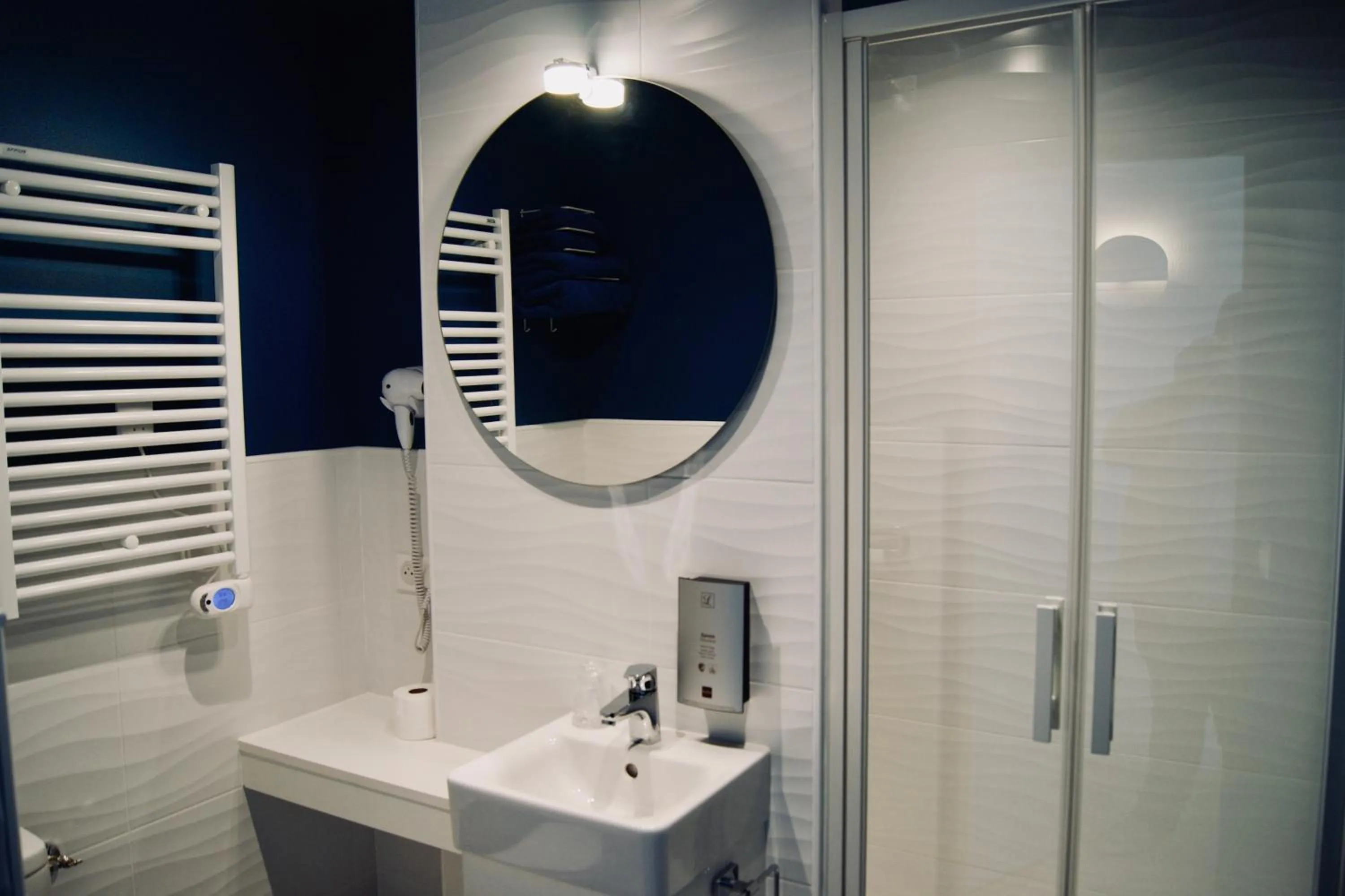 Bathroom in Logis Hôtel L'Air Marin