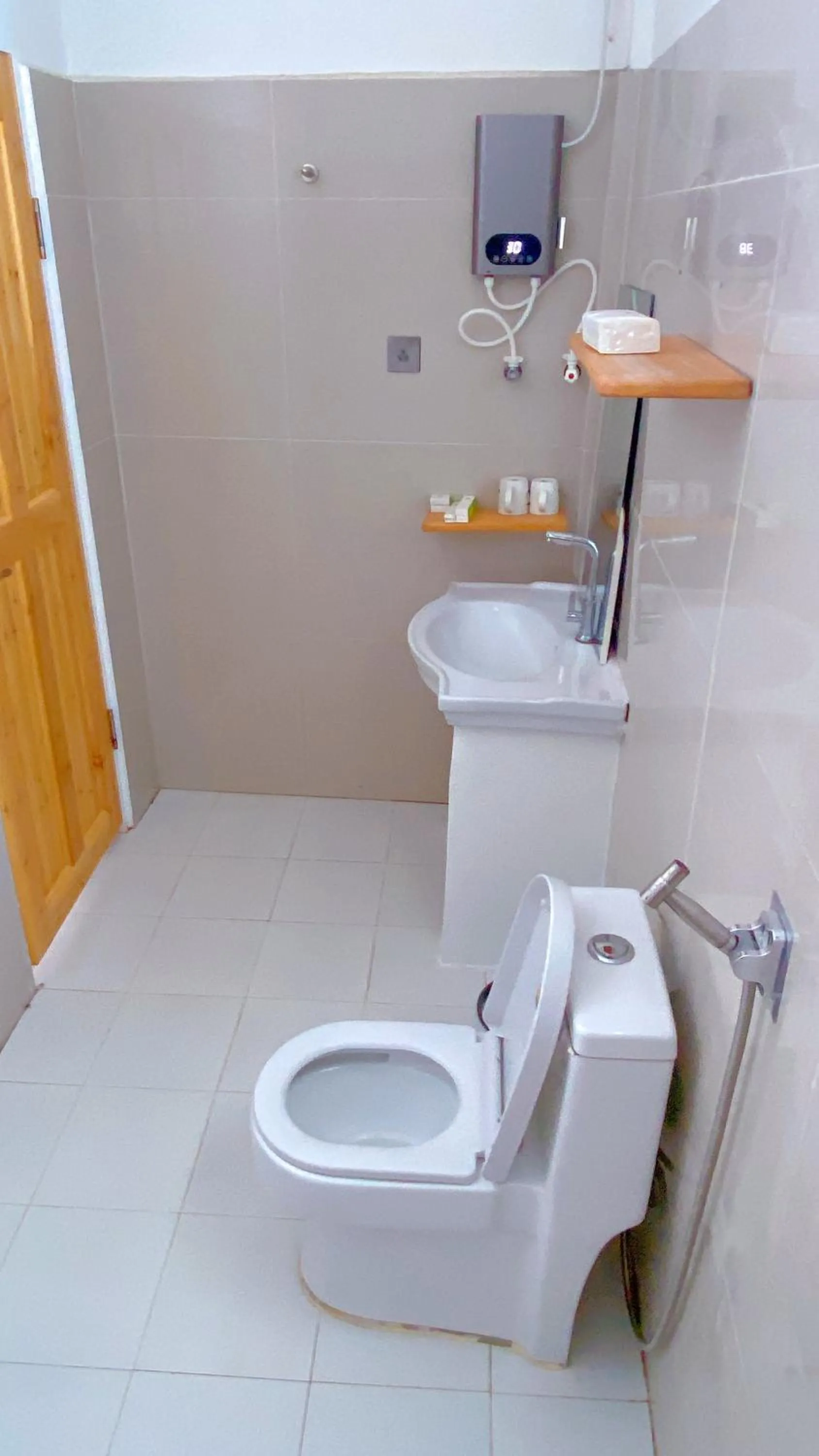 Toilet in Green Mango Resort