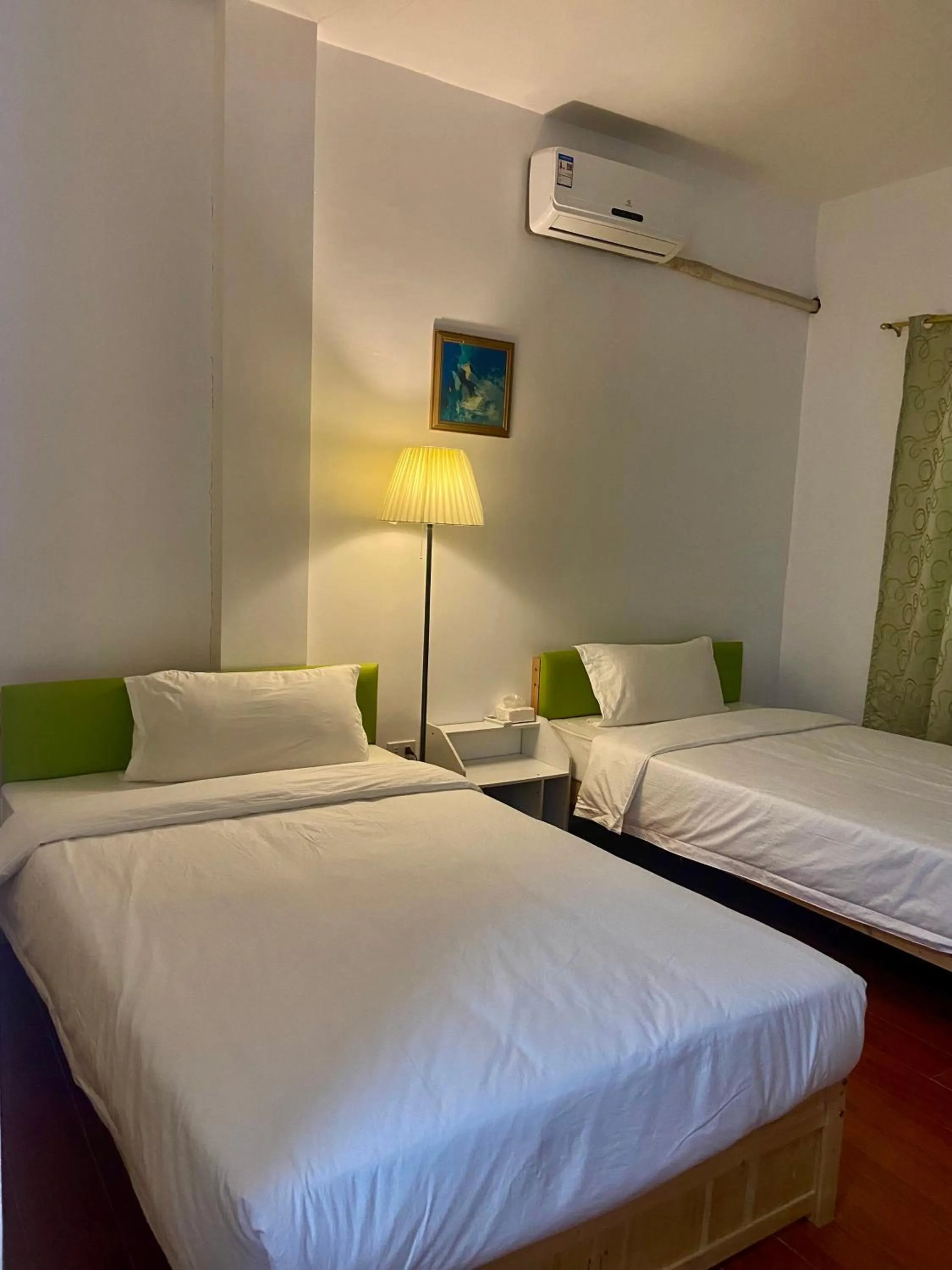 Bed in Green Mango Resort