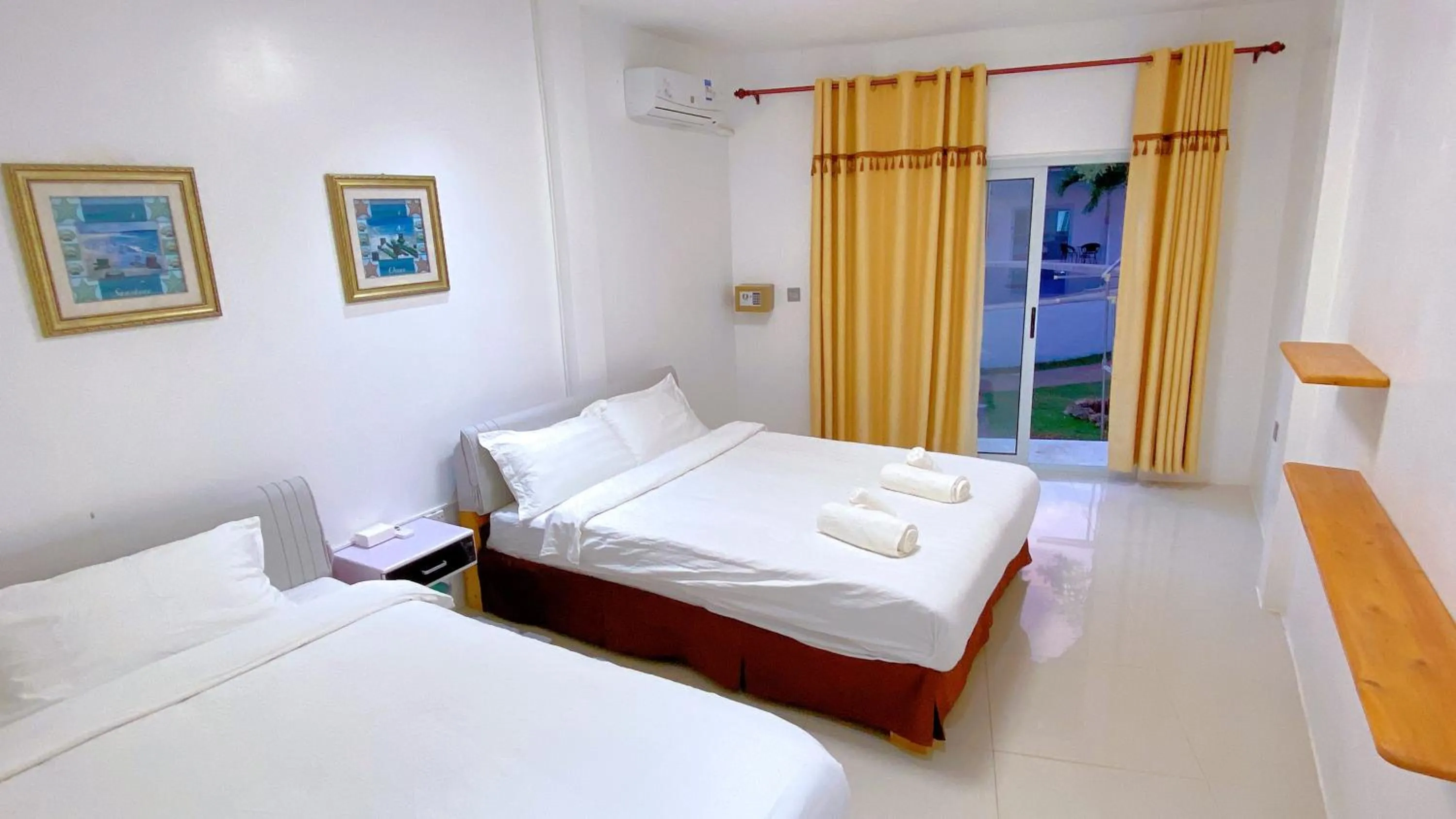Photo of the whole room, Bed in Green Mango Resort