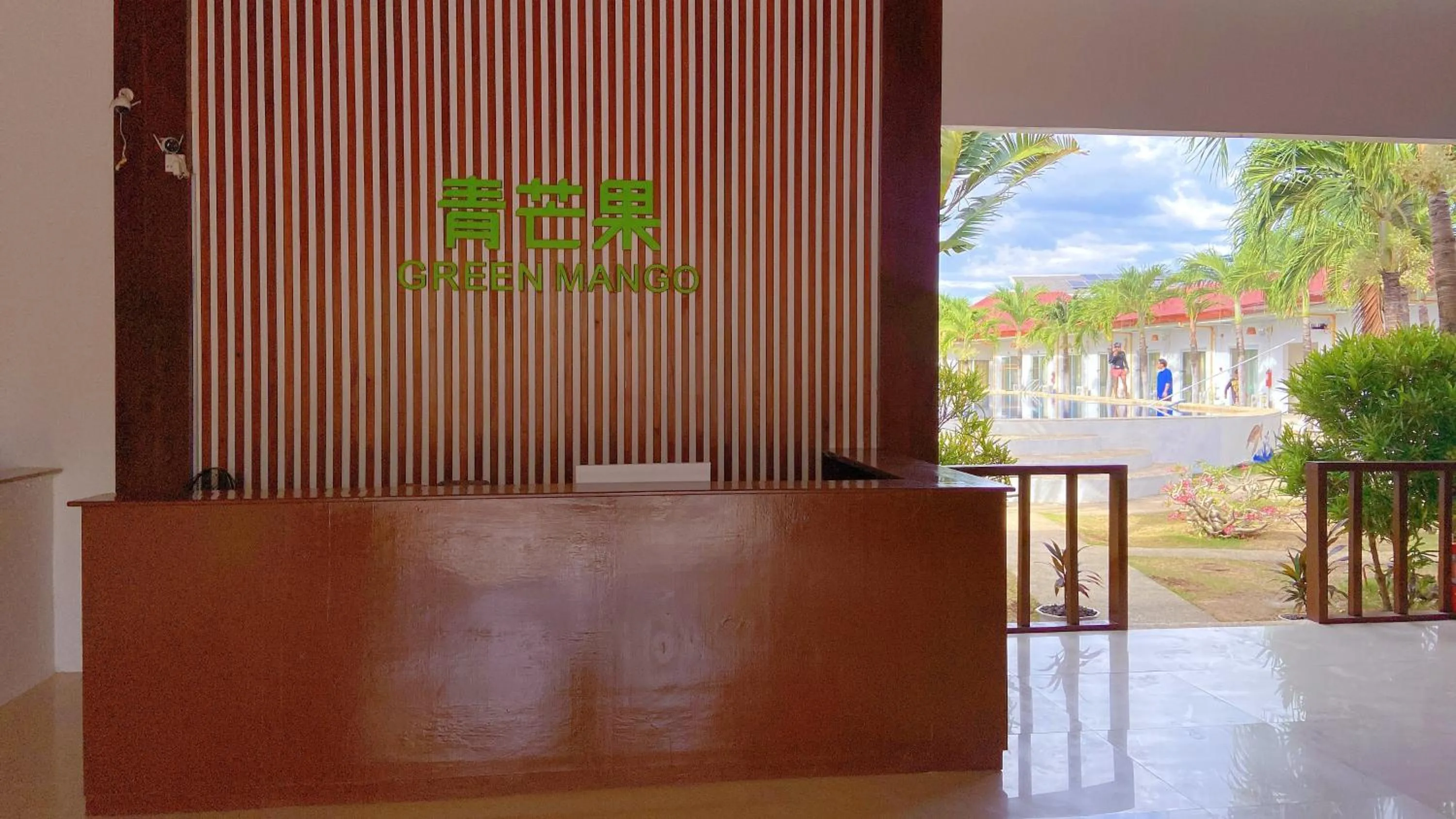 Property logo or sign in Green Mango Resort