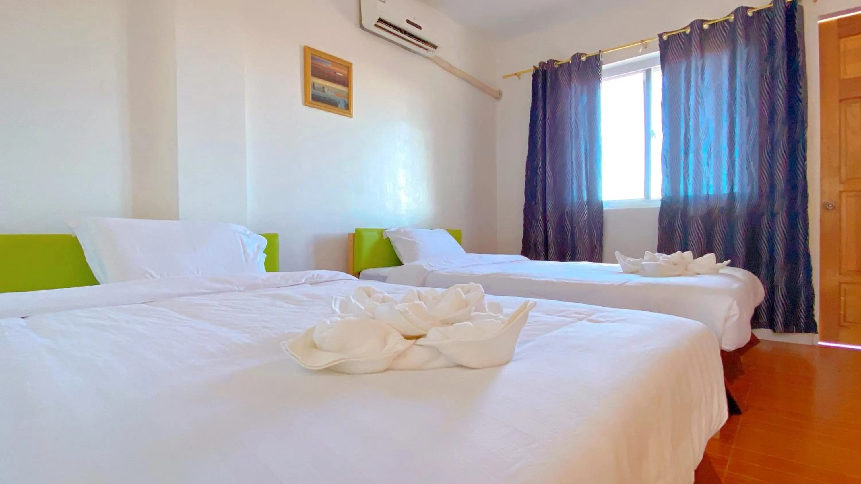 Photo of the whole room, Bed in Green Mango Resort