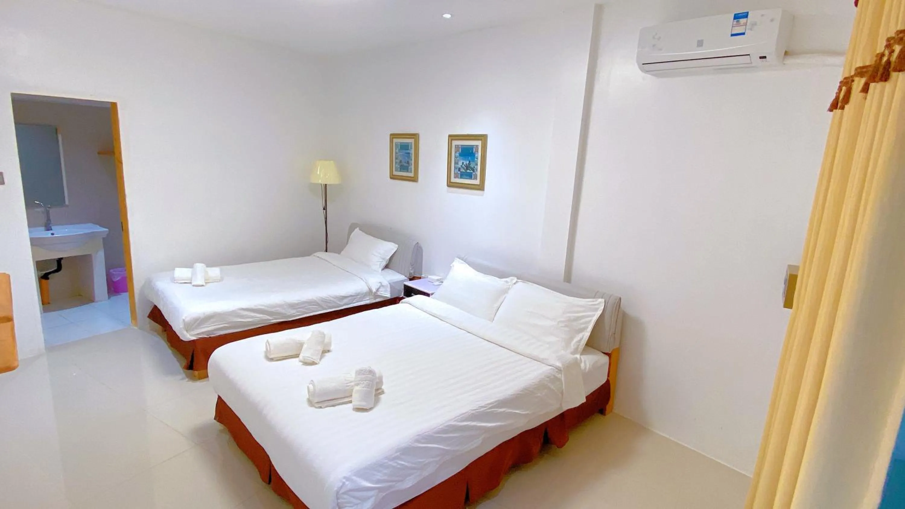 Photo of the whole room, Bed in Green Mango Resort