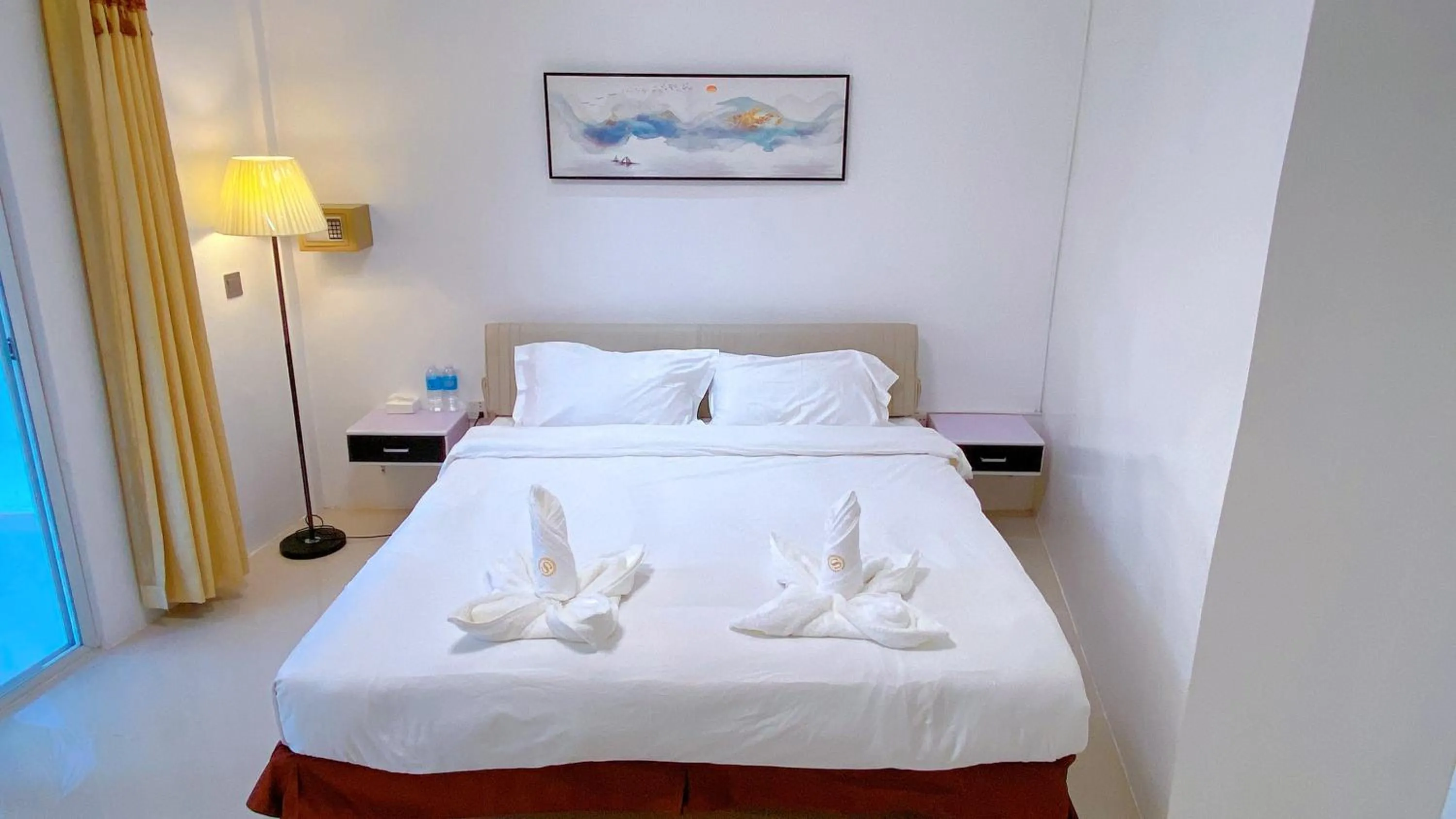 Bed in Green Mango Resort