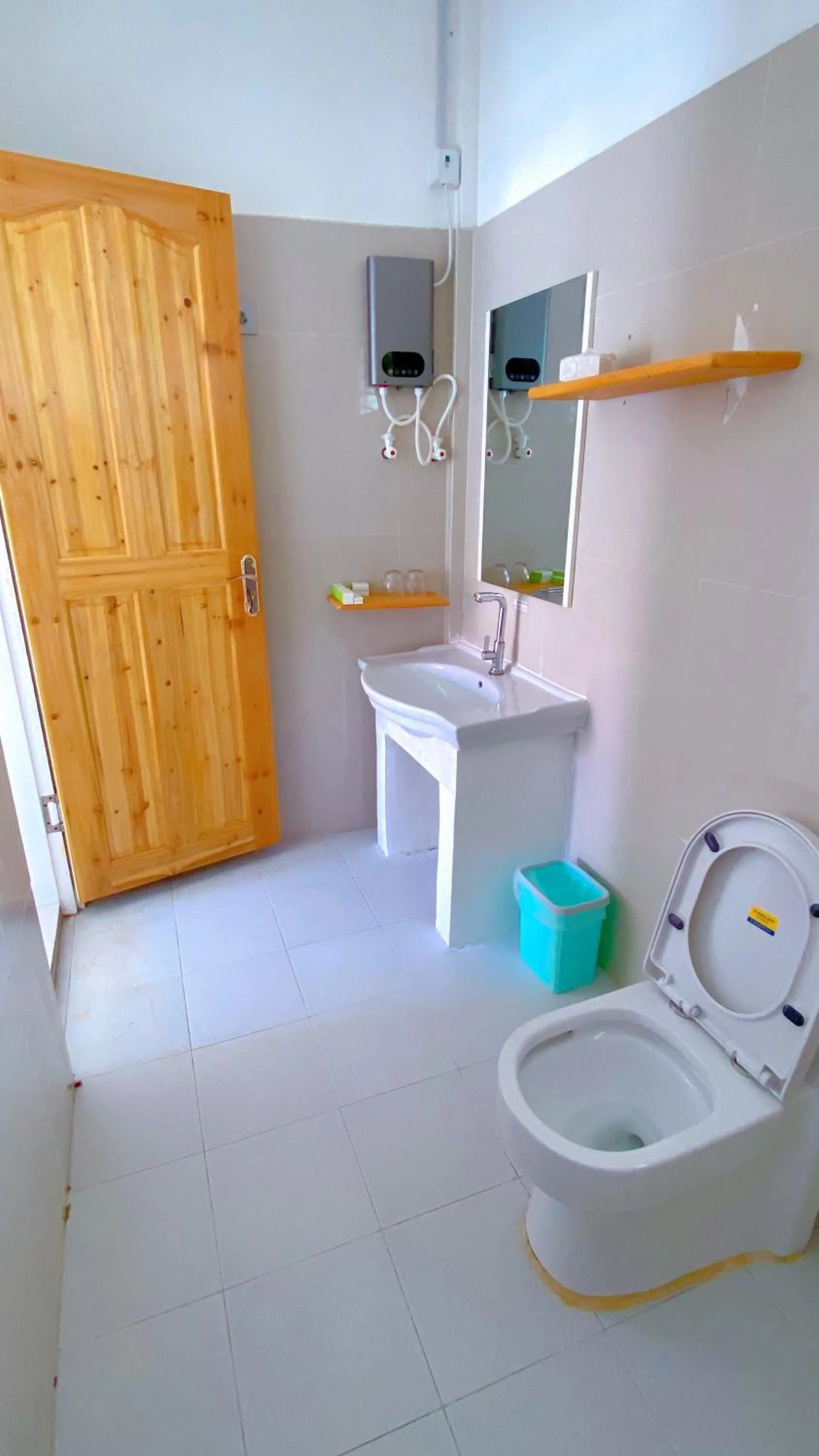 Toilet in Green Mango Resort