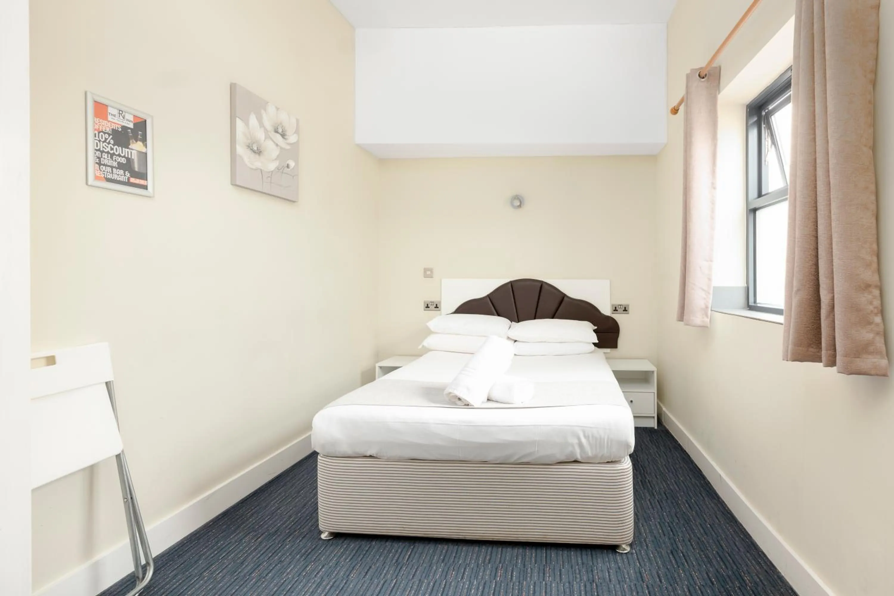 Bedroom, Bed in The R Inn Hotel