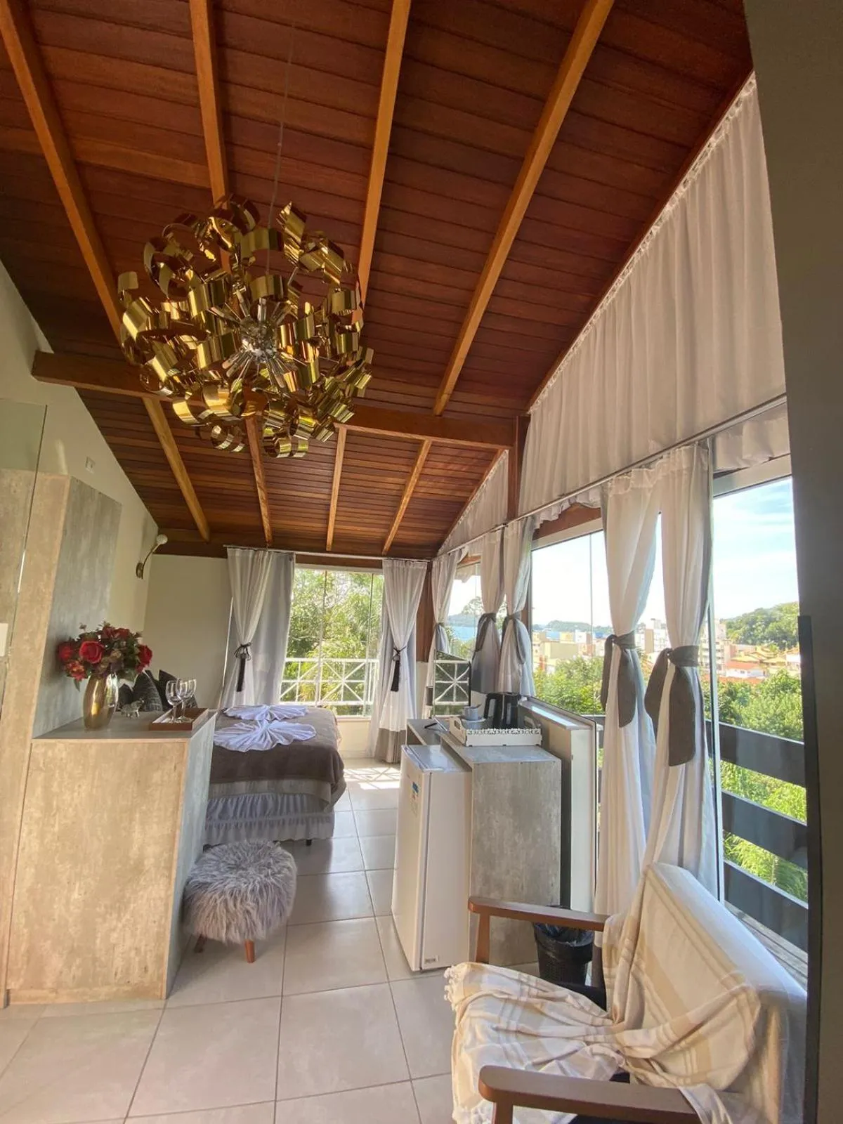 Living room in Bombinhas Guest House