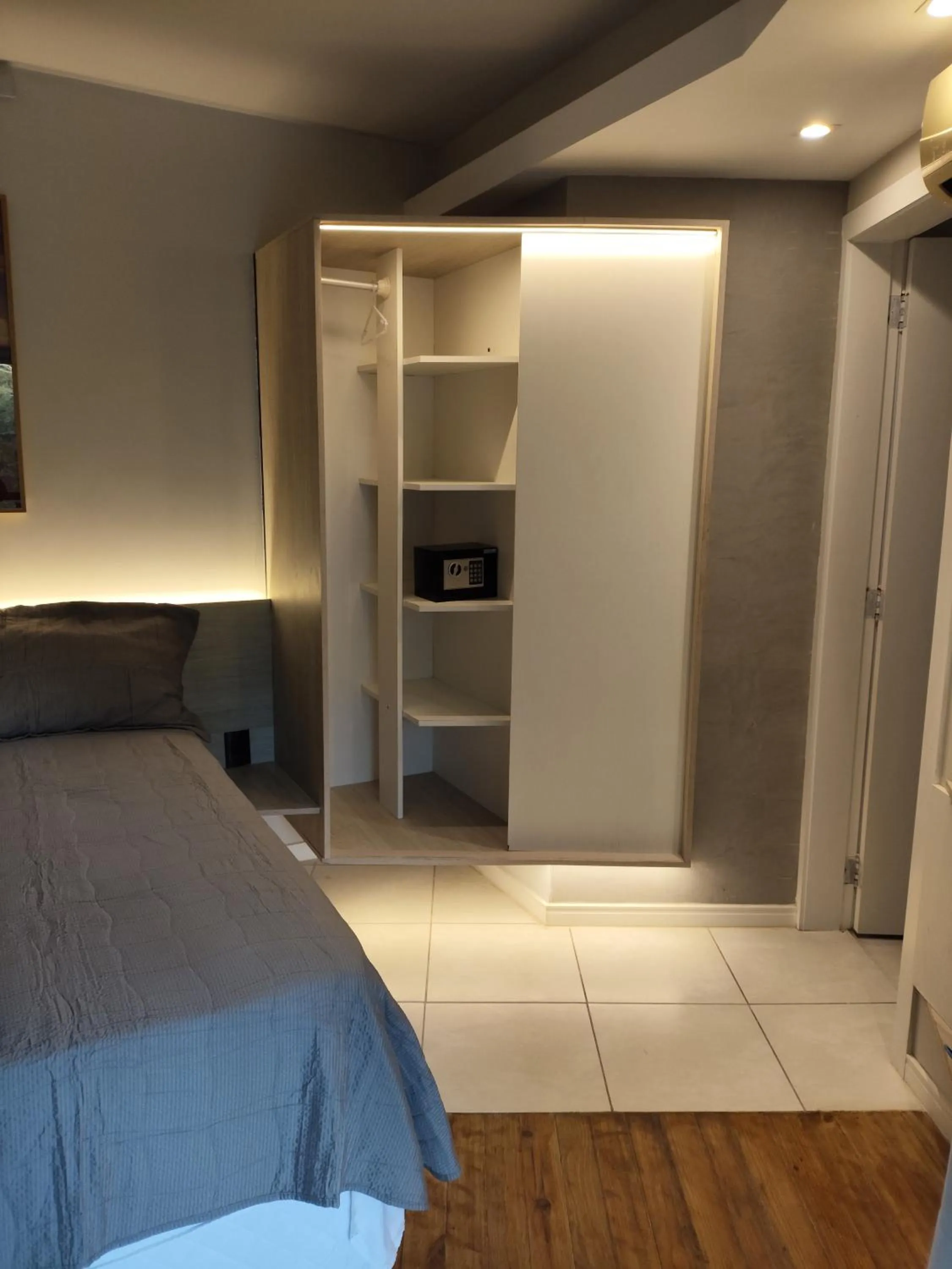 Bed in Bombinhas Guest House