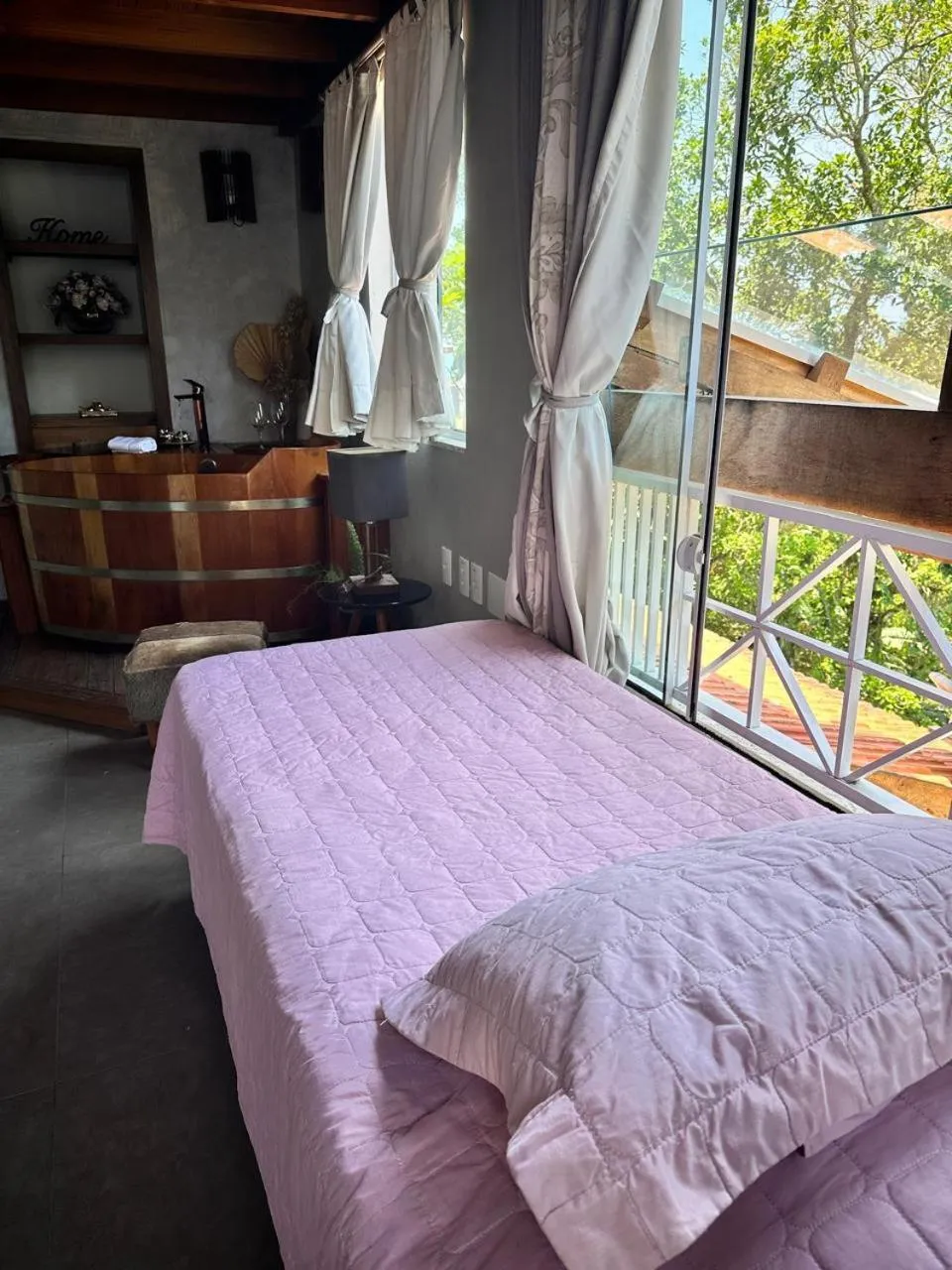 Bed in Bombinhas Guest House