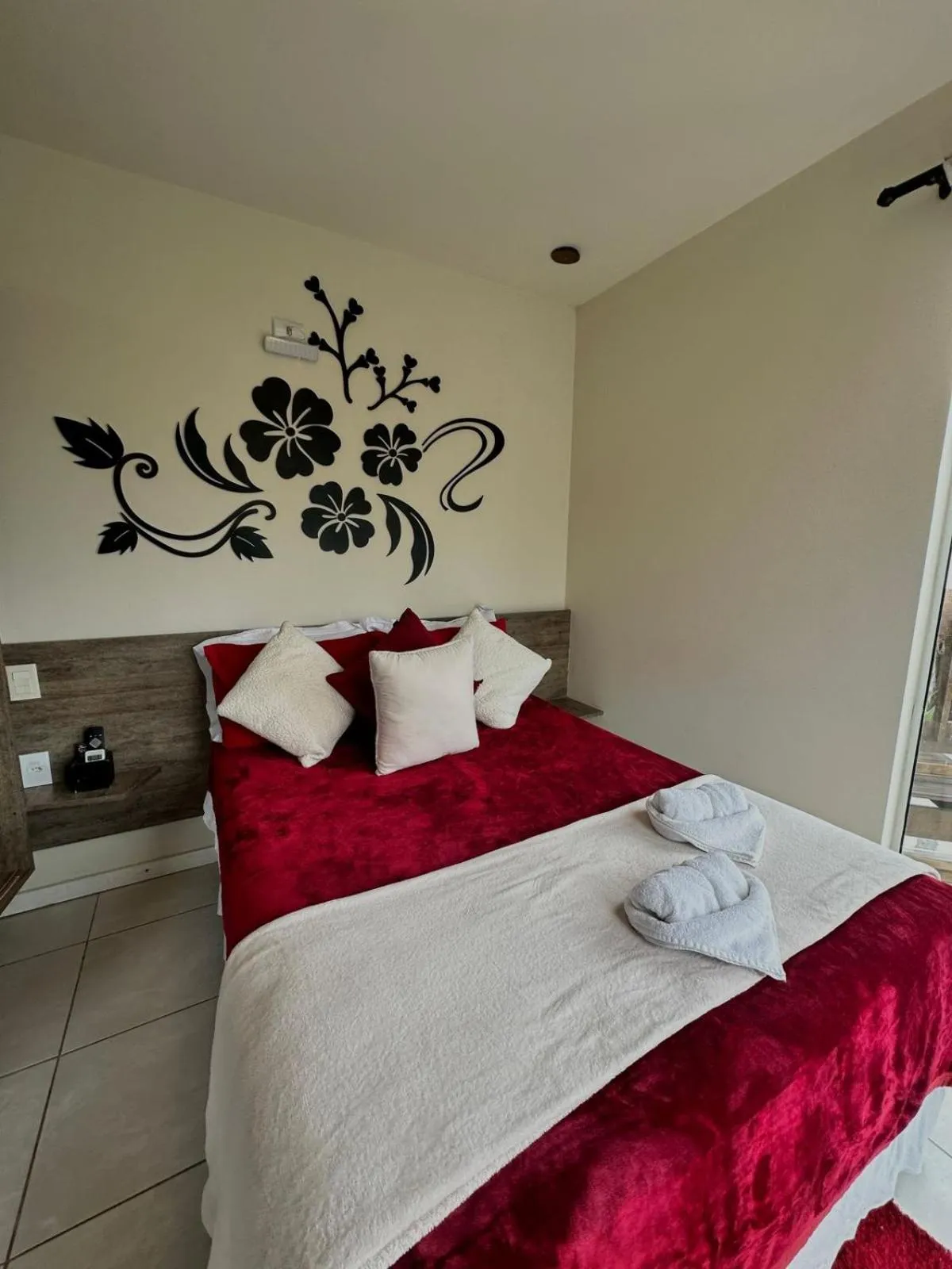 Bed in Bombinhas Guest House