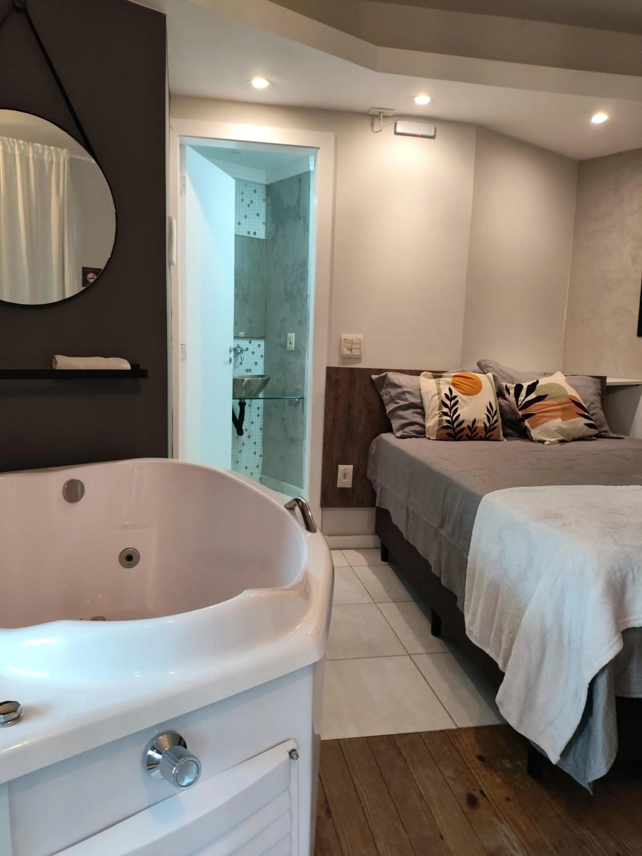 Bed in Bombinhas Guest House