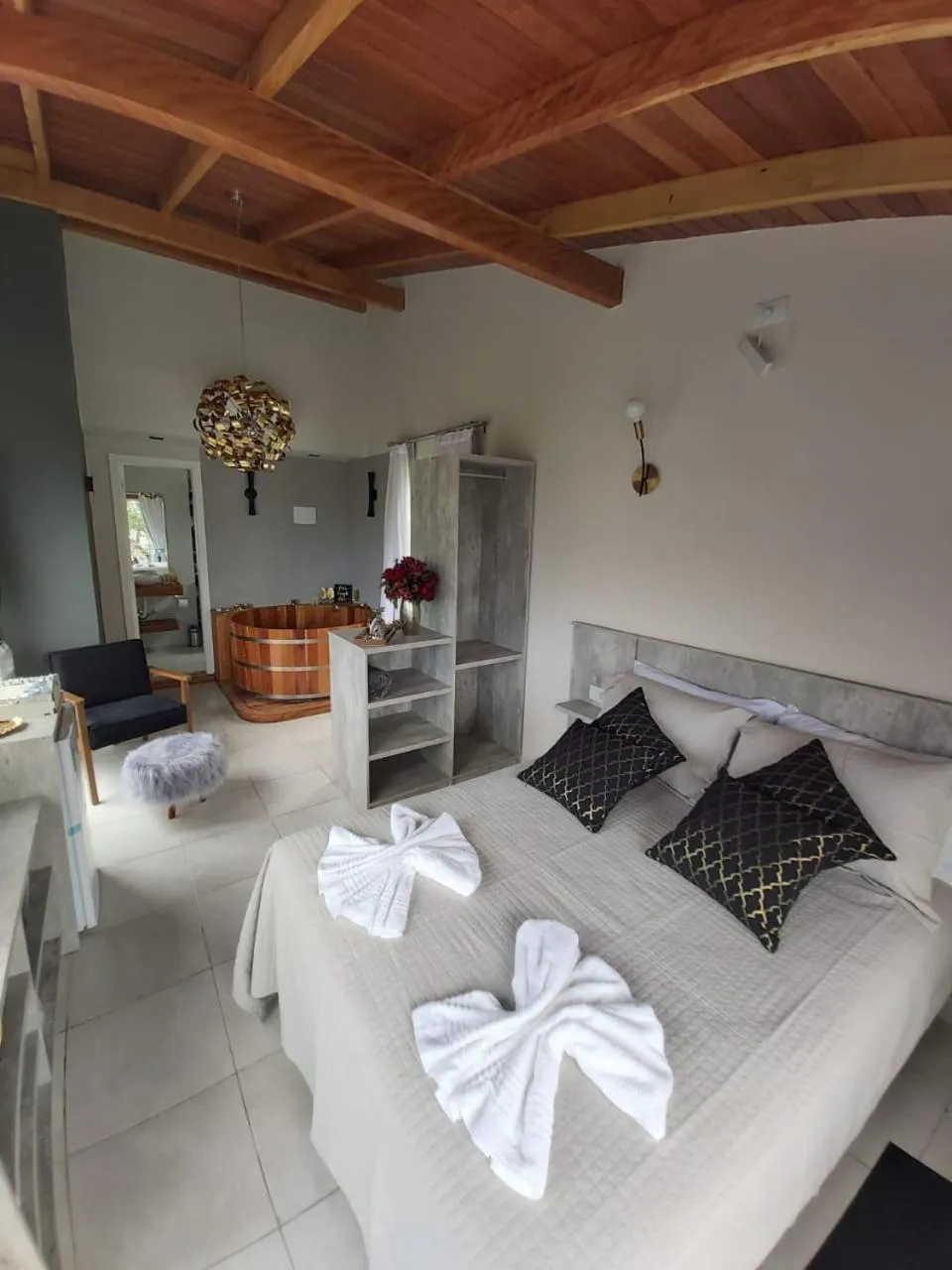 Bed in Bombinhas Guest House