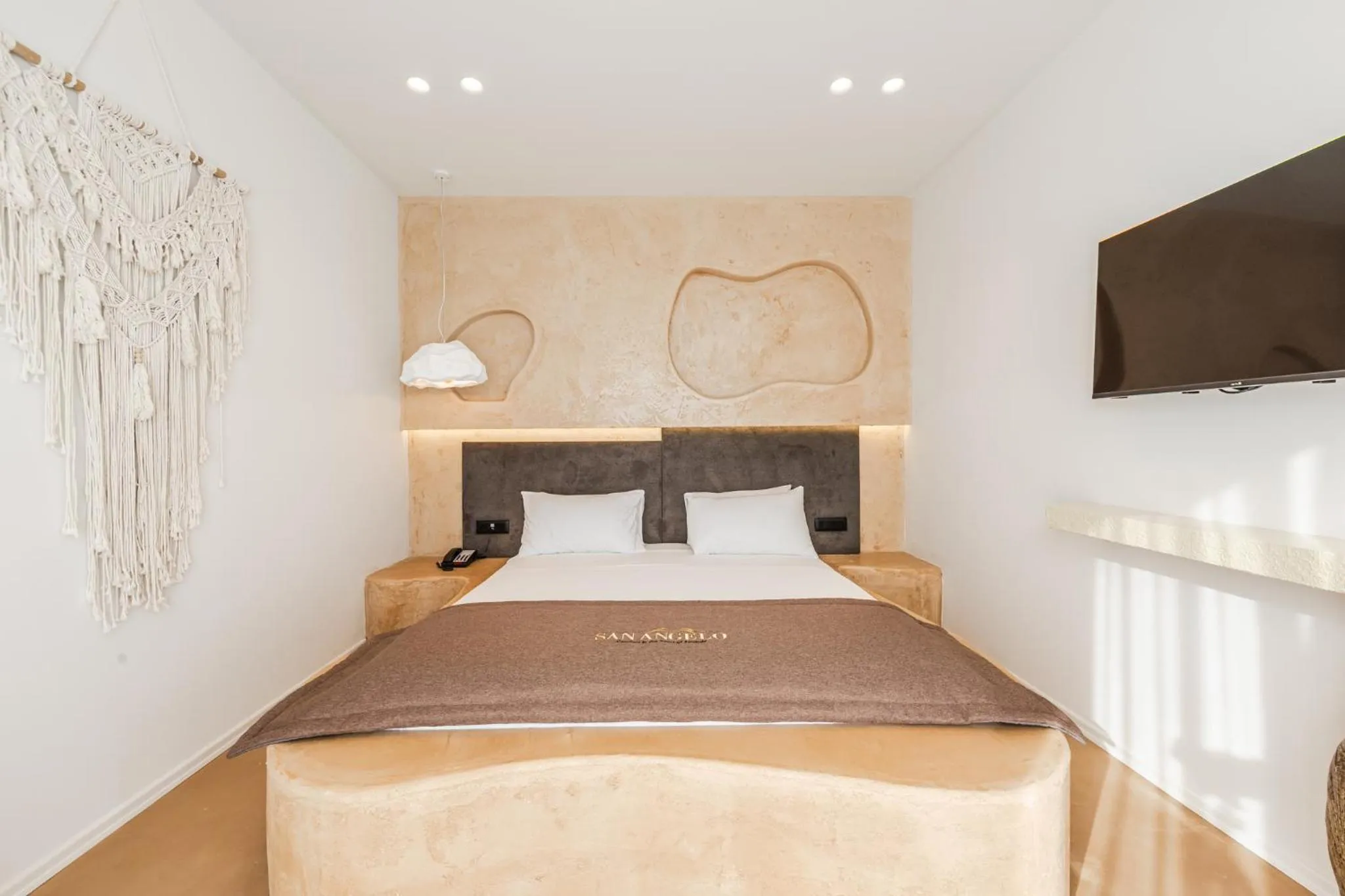 Bed in San Angelo Luxury Resort & Spa - Adults Only