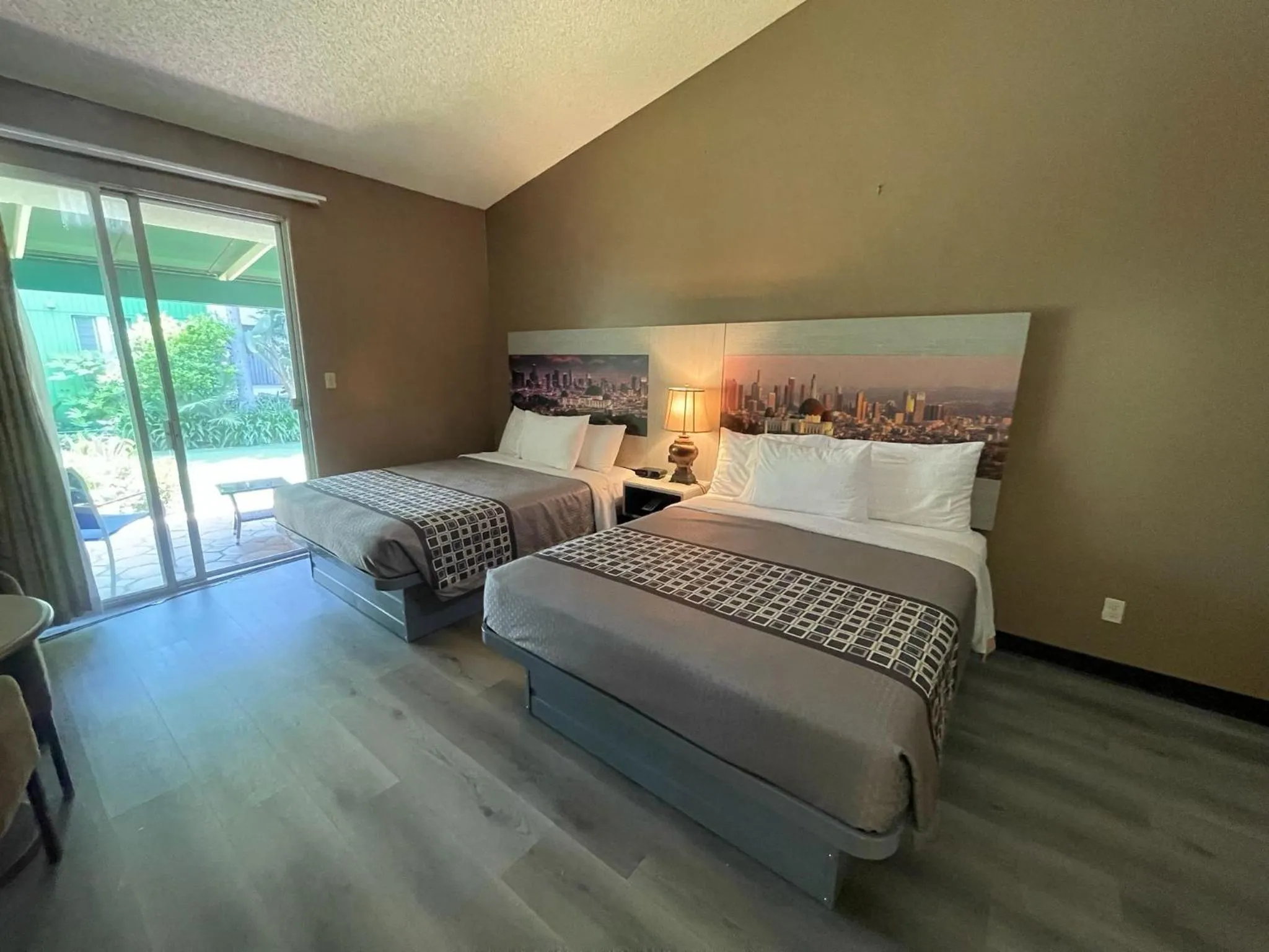 Bed in Hotel Pacific Garden