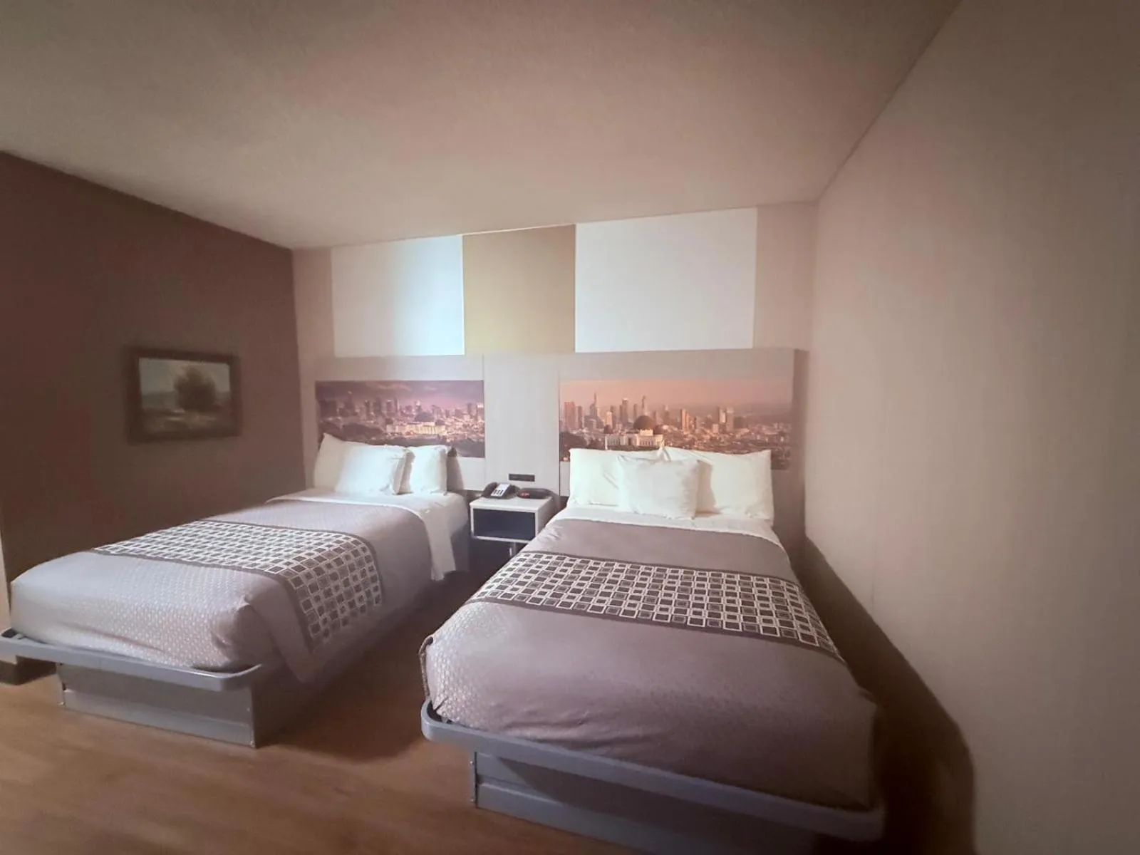 Bed in Hotel Pacific Garden