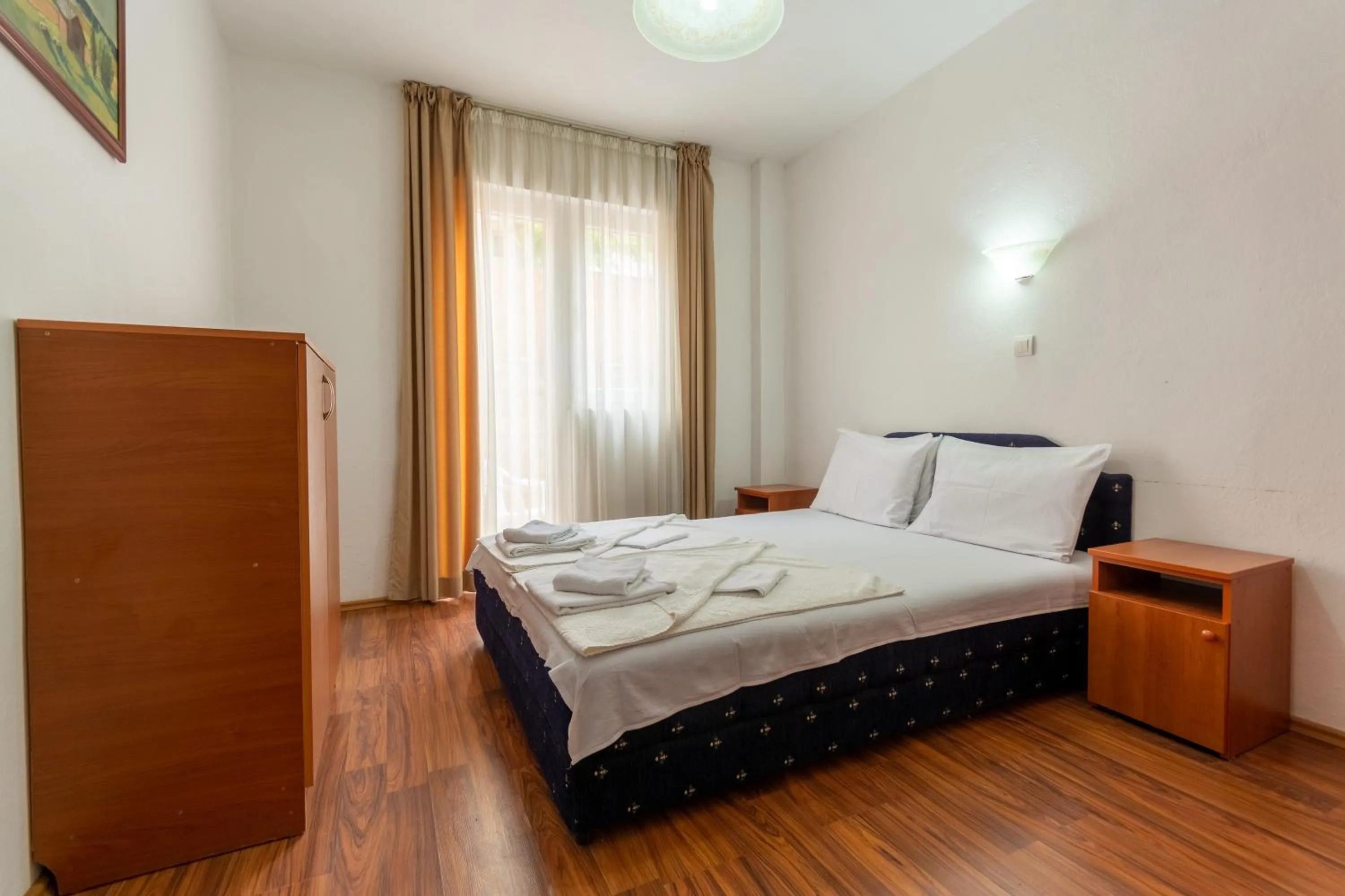 Bed in Evropa Lux Apartments