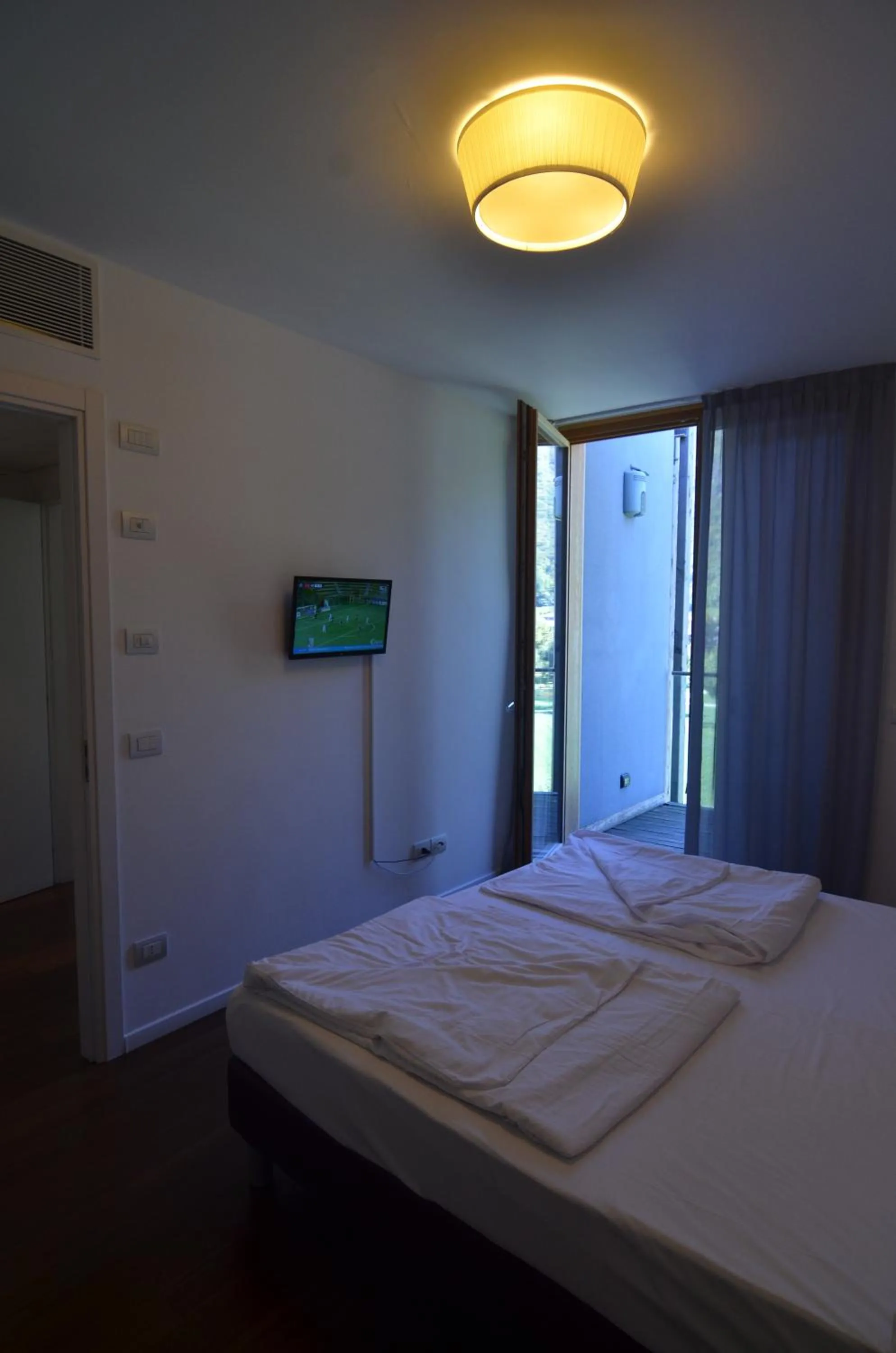 Bed in Komodo short stay apartments