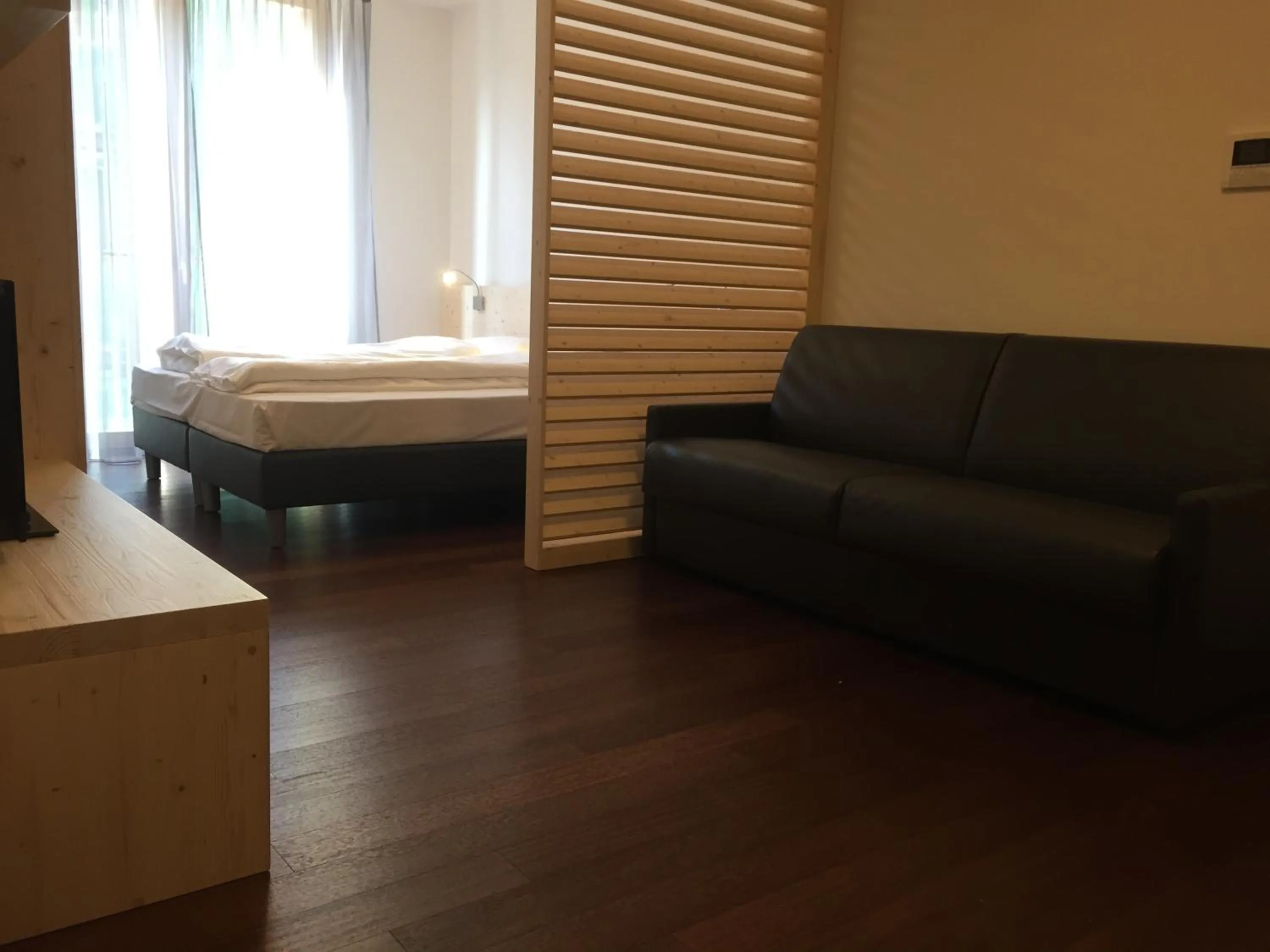 Day, Bed in Komodo short stay apartments