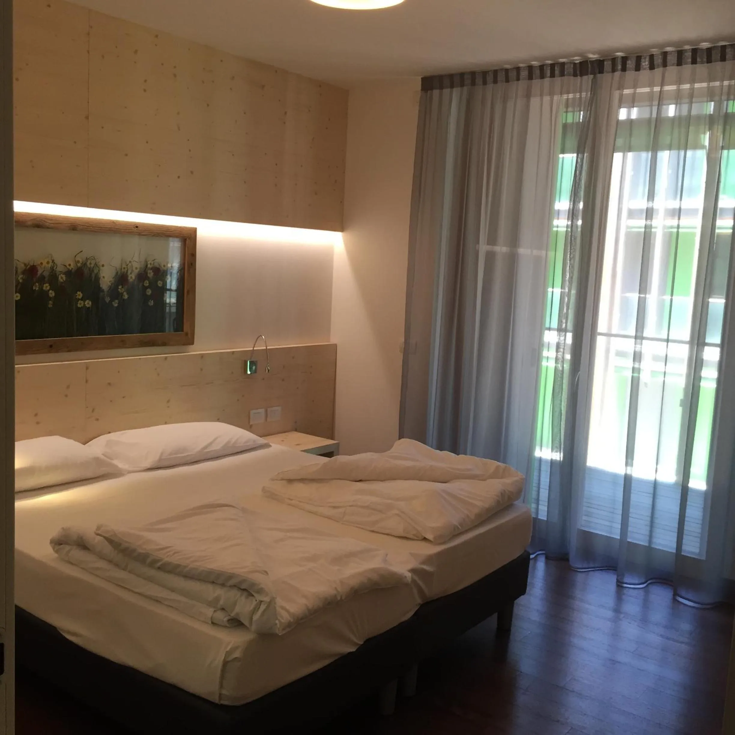 Day, Bed in Komodo short stay apartments