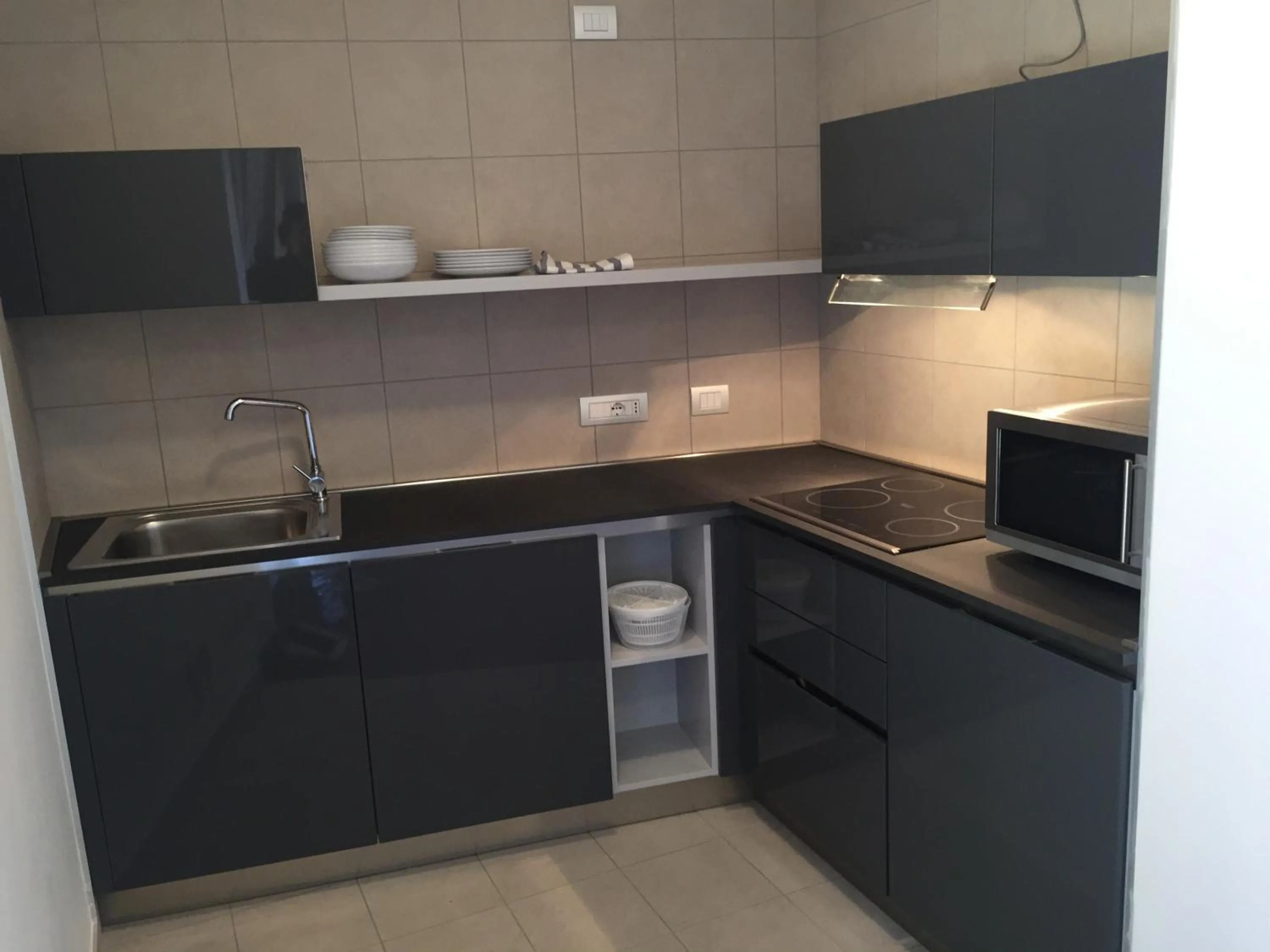 Kitchen or kitchenette in Komodo short stay apartments