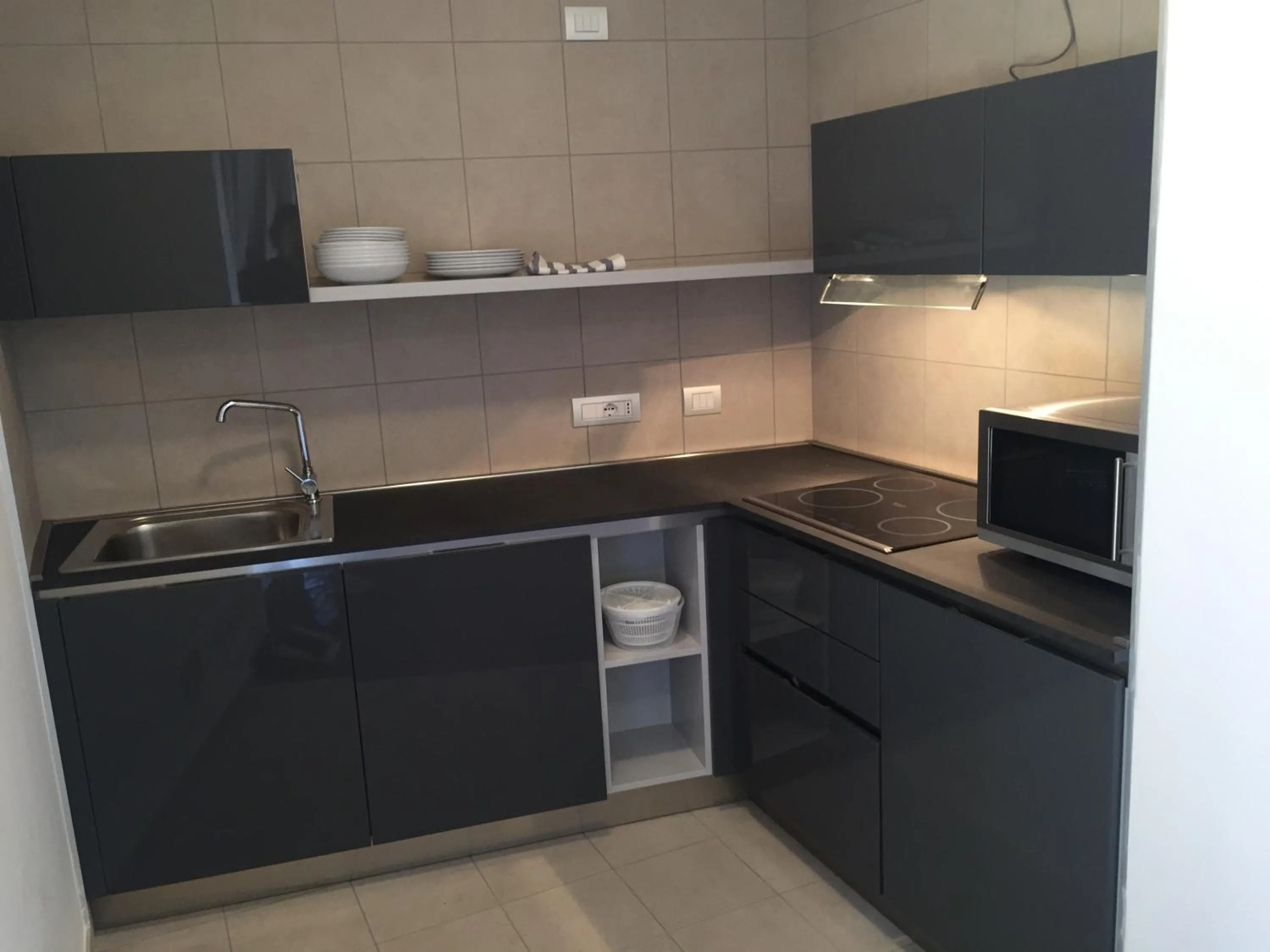 Kitchen or kitchenette in Komodo short stay apartments