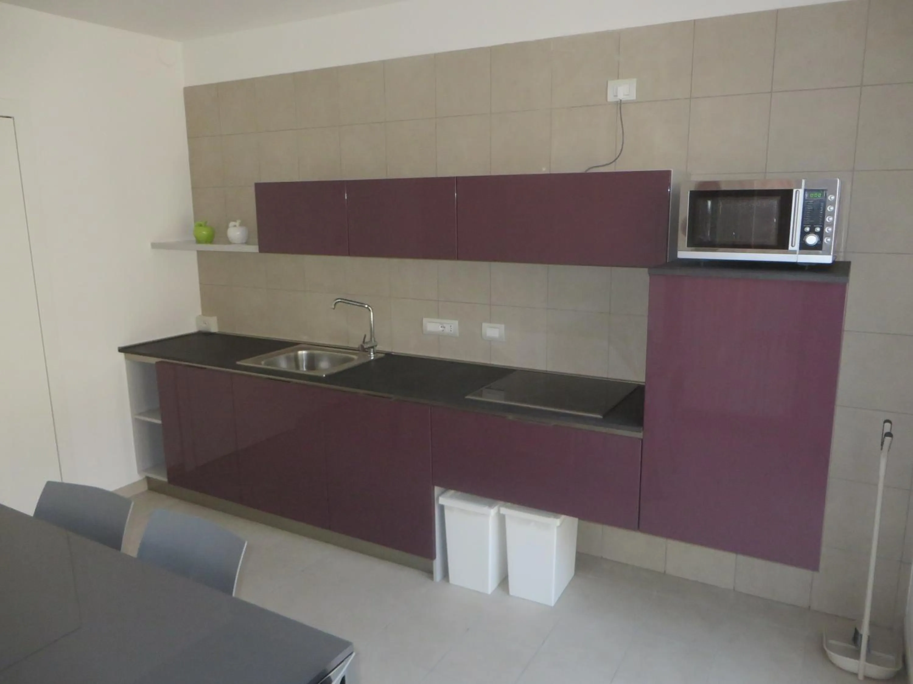 Kitchen or kitchenette in Komodo short stay apartments