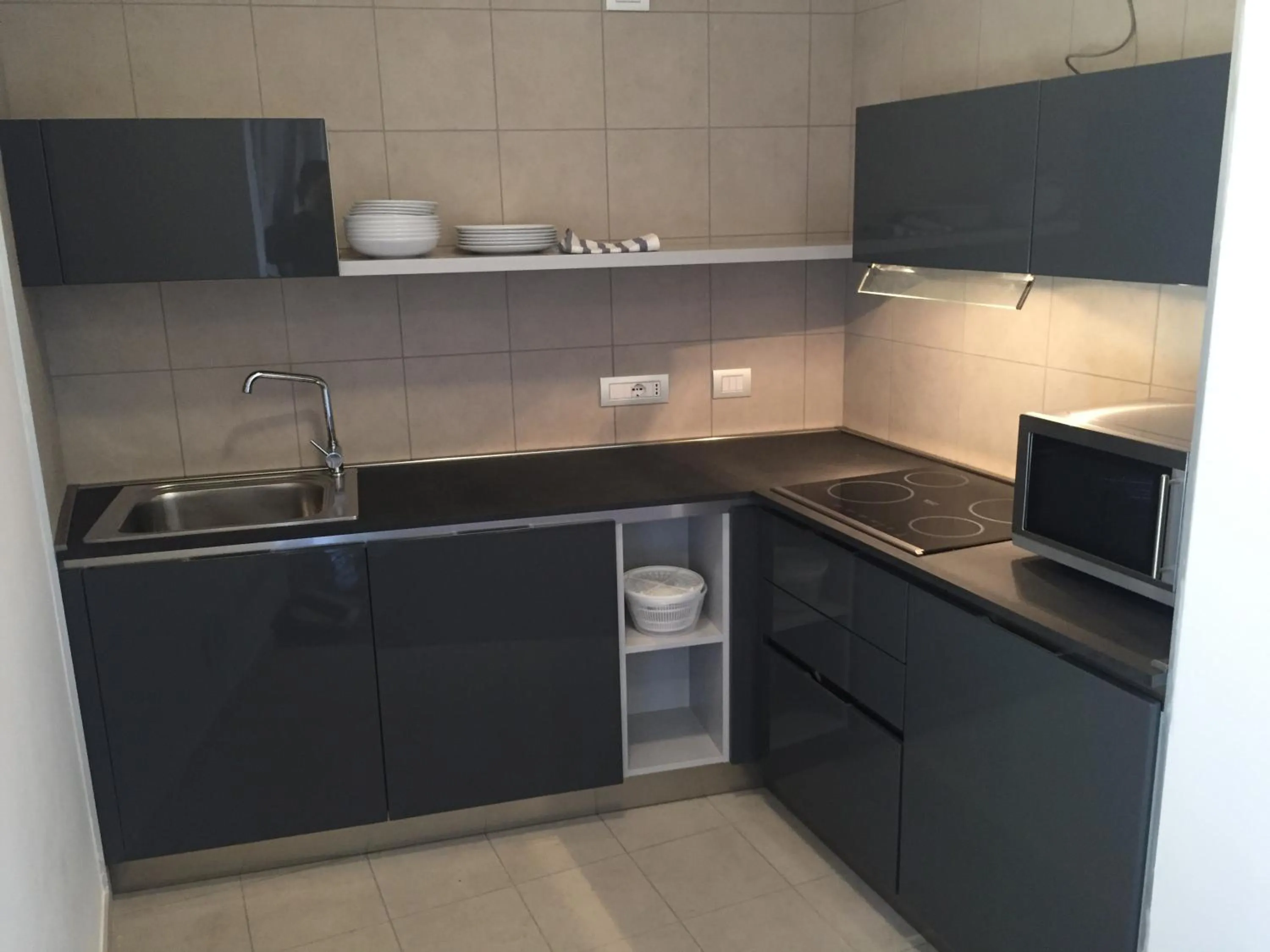Kitchen or kitchenette in Komodo short stay apartments