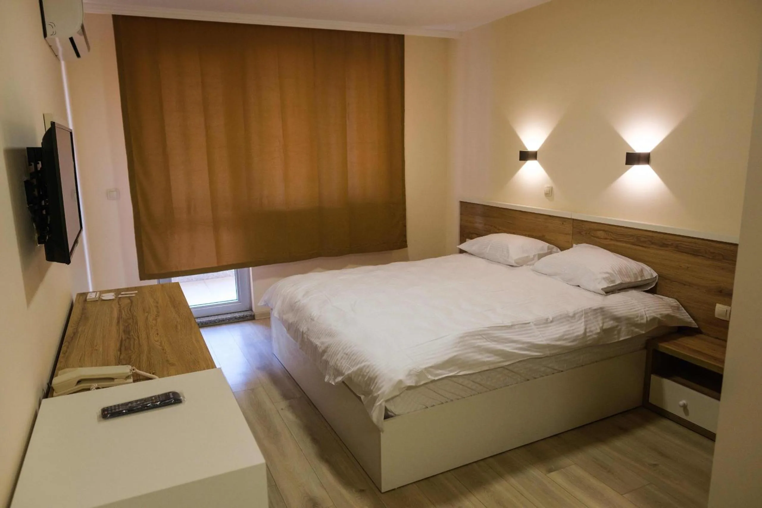 Bed in HOTEL BAYKO
