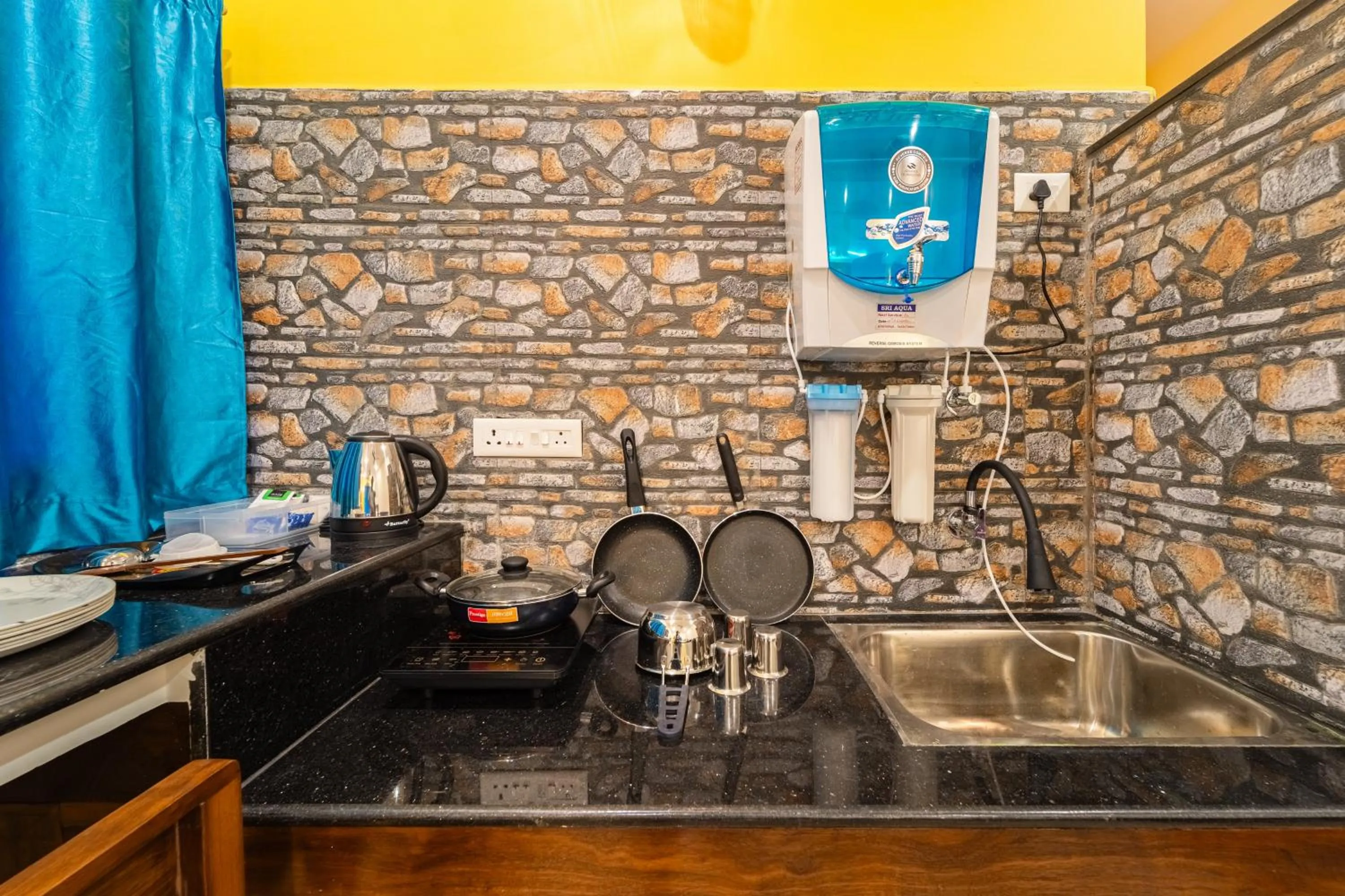 Kitchen or kitchenette in Teak Leaf Gateway Villa with Swimming Pool Indoor Games