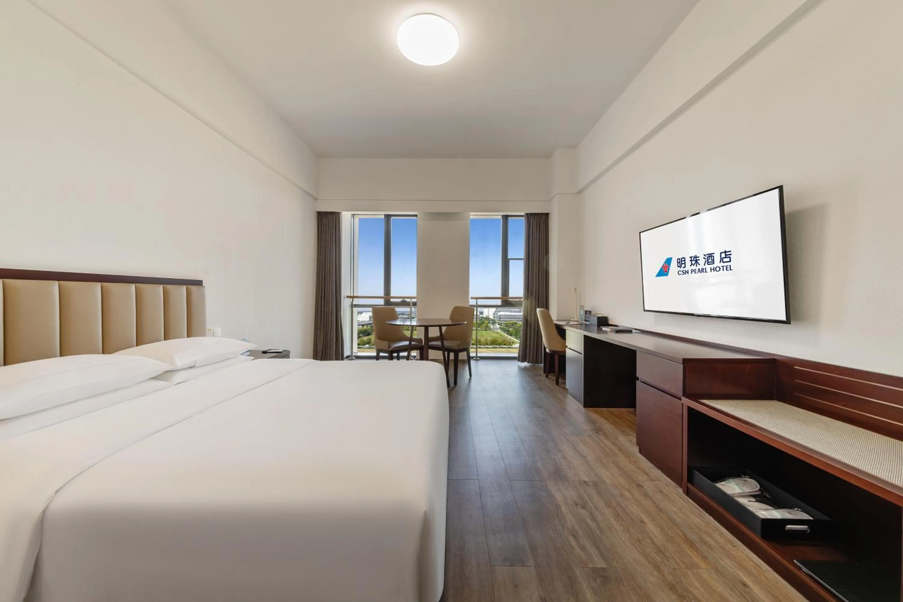 Photo of the whole room, Bed in Beijing CSN Pearl Hotel