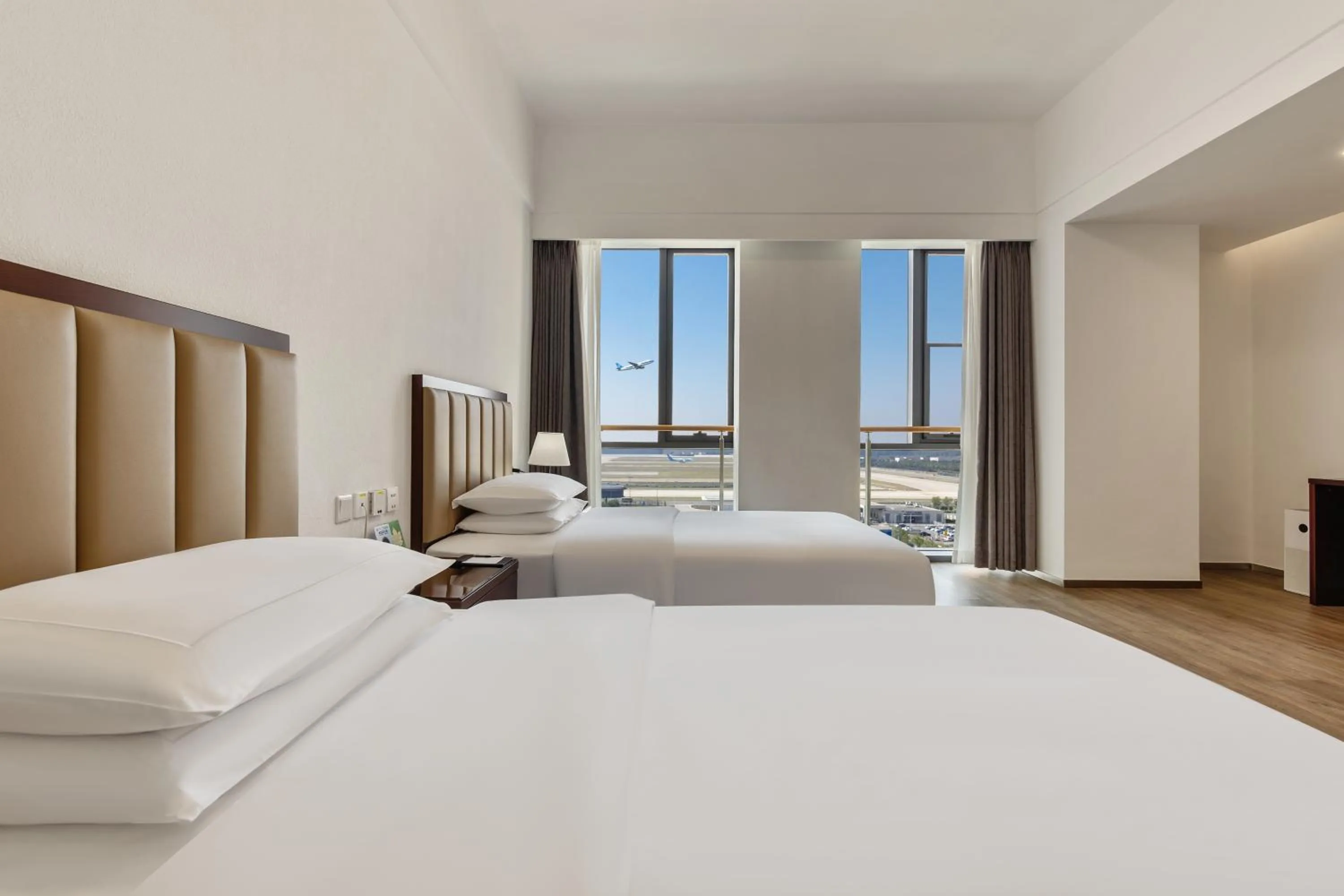 Photo of the whole room, Bed in Beijing CSN Pearl Hotel