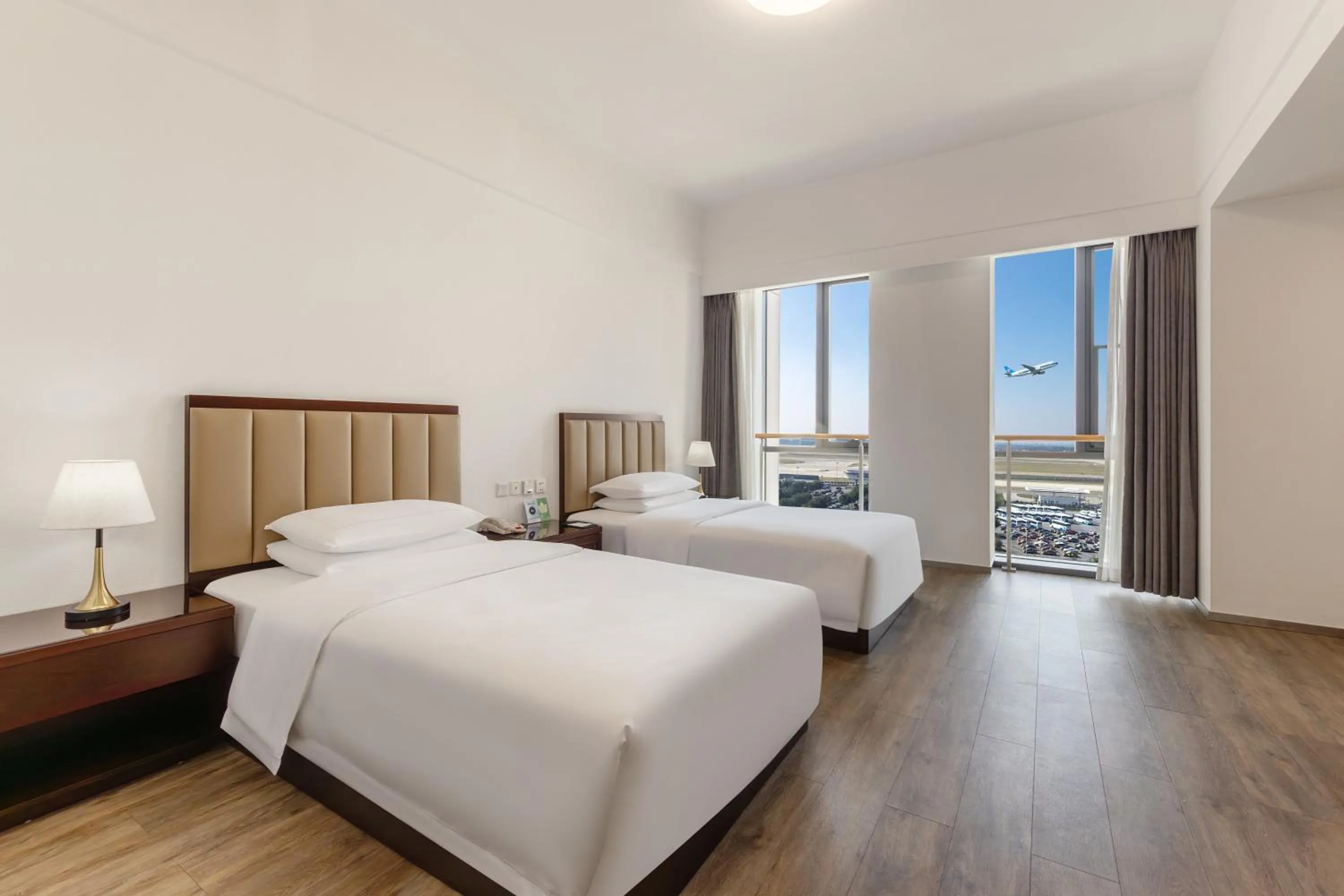 Photo of the whole room, Bed in Beijing CSN Pearl Hotel