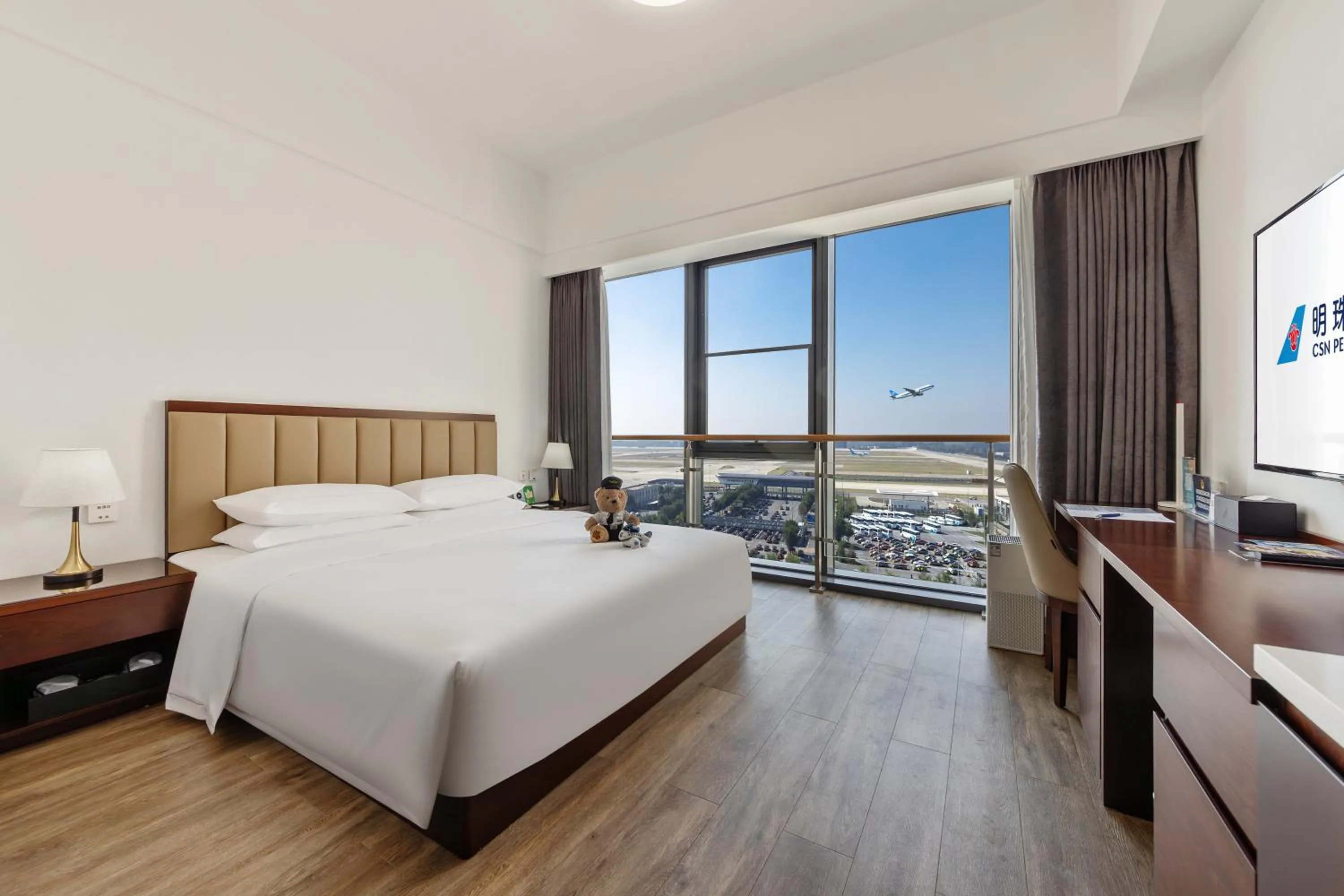 Photo of the whole room, Bed in Beijing CSN Pearl Hotel