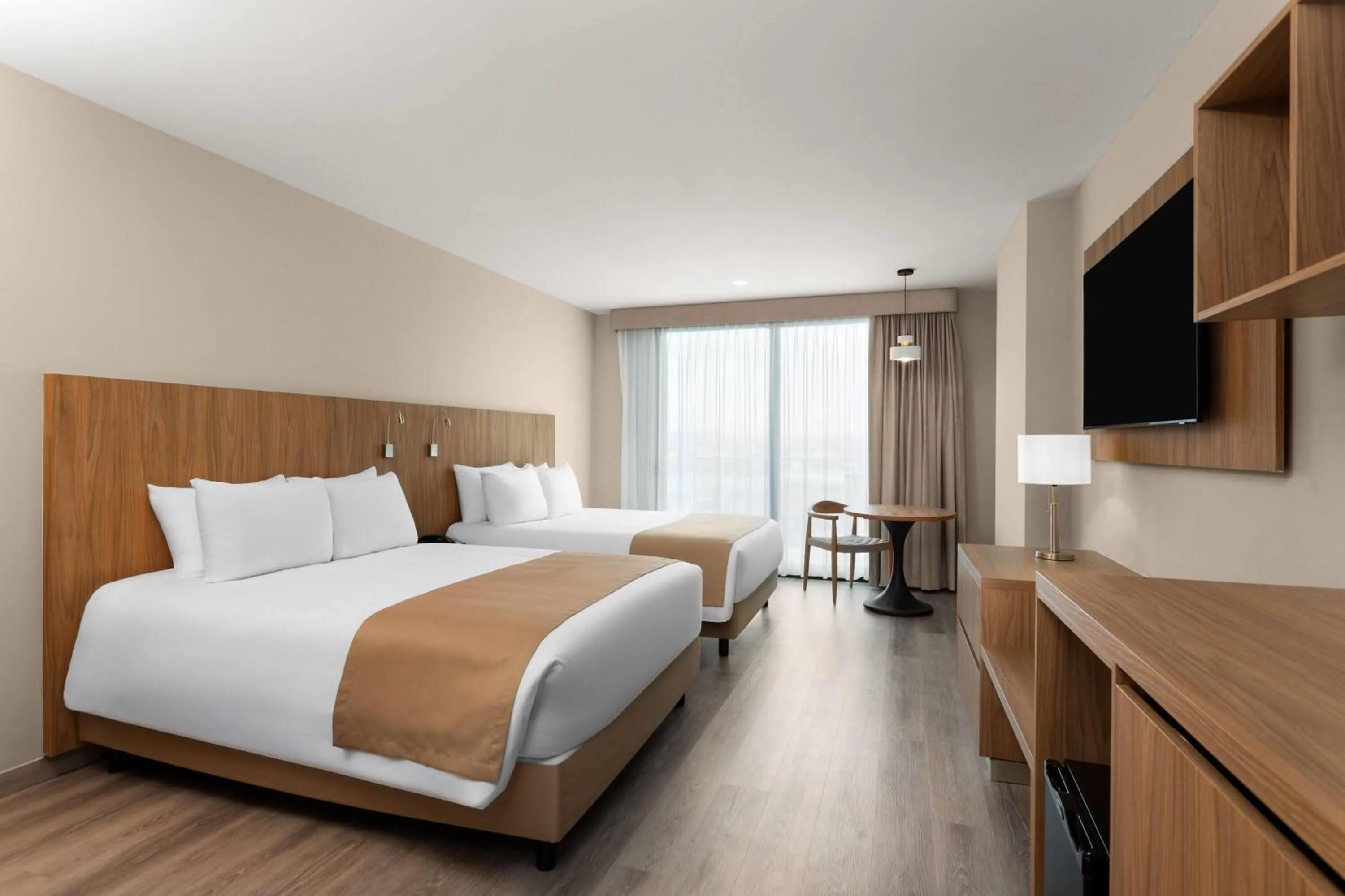 Photo of the whole room, Bed in Wyndham Garden Mazatlan Marina