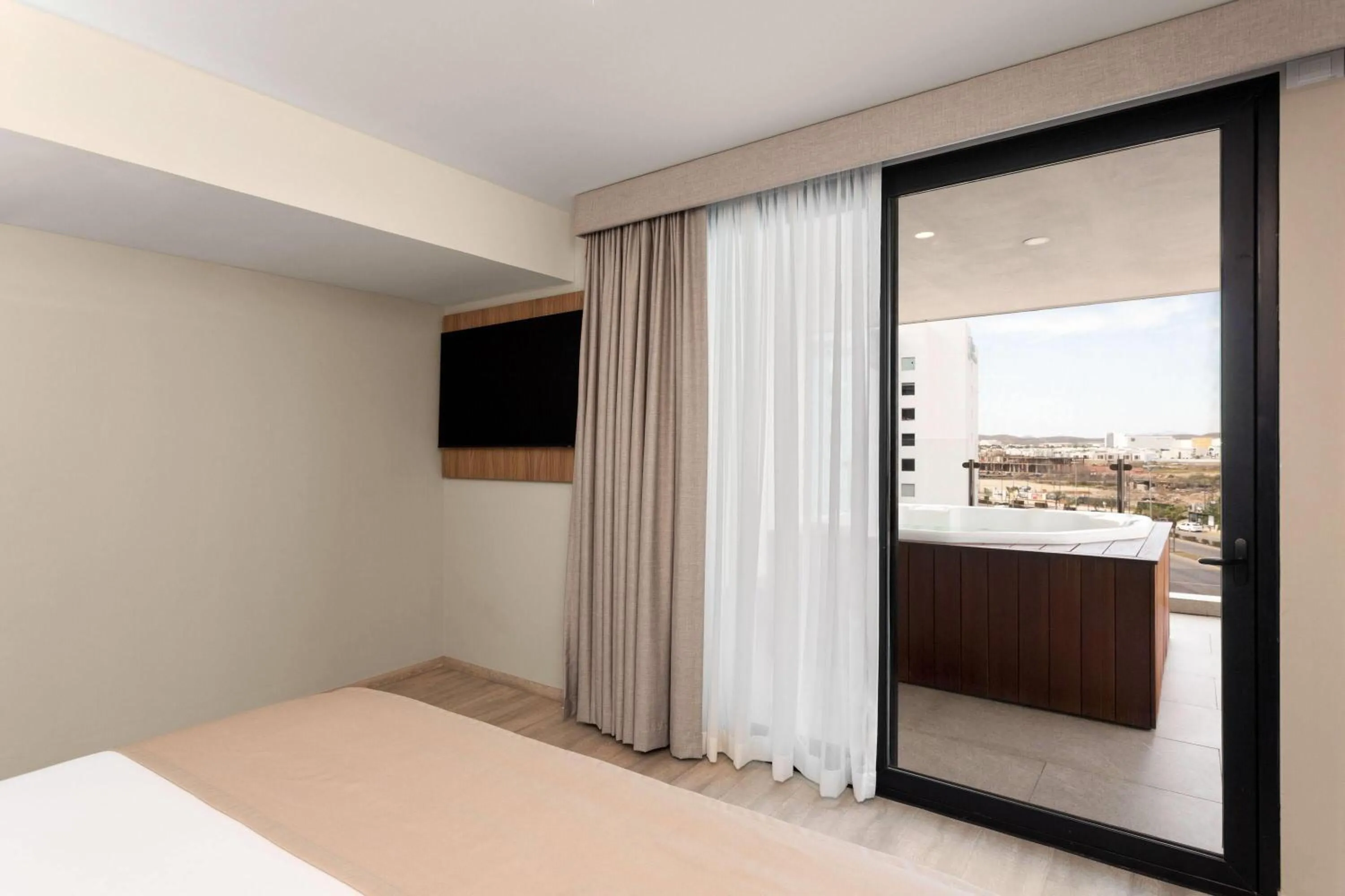 Photo of the whole room, Bed in Wyndham Garden Mazatlan Marina