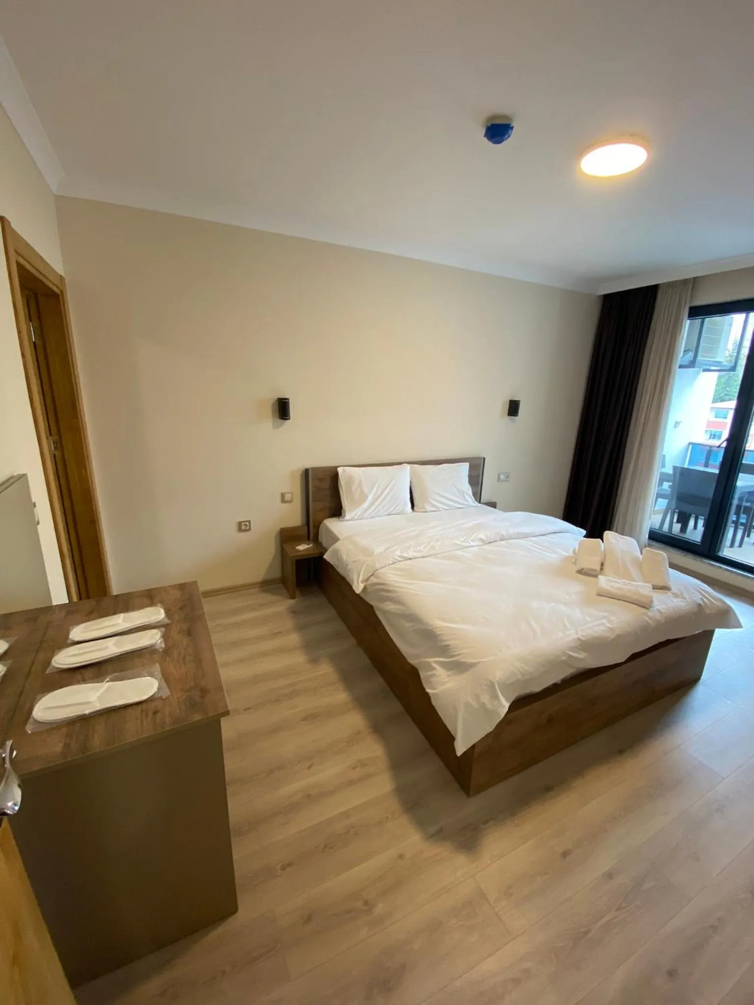 Bed in Rena Grand Residence & Suit