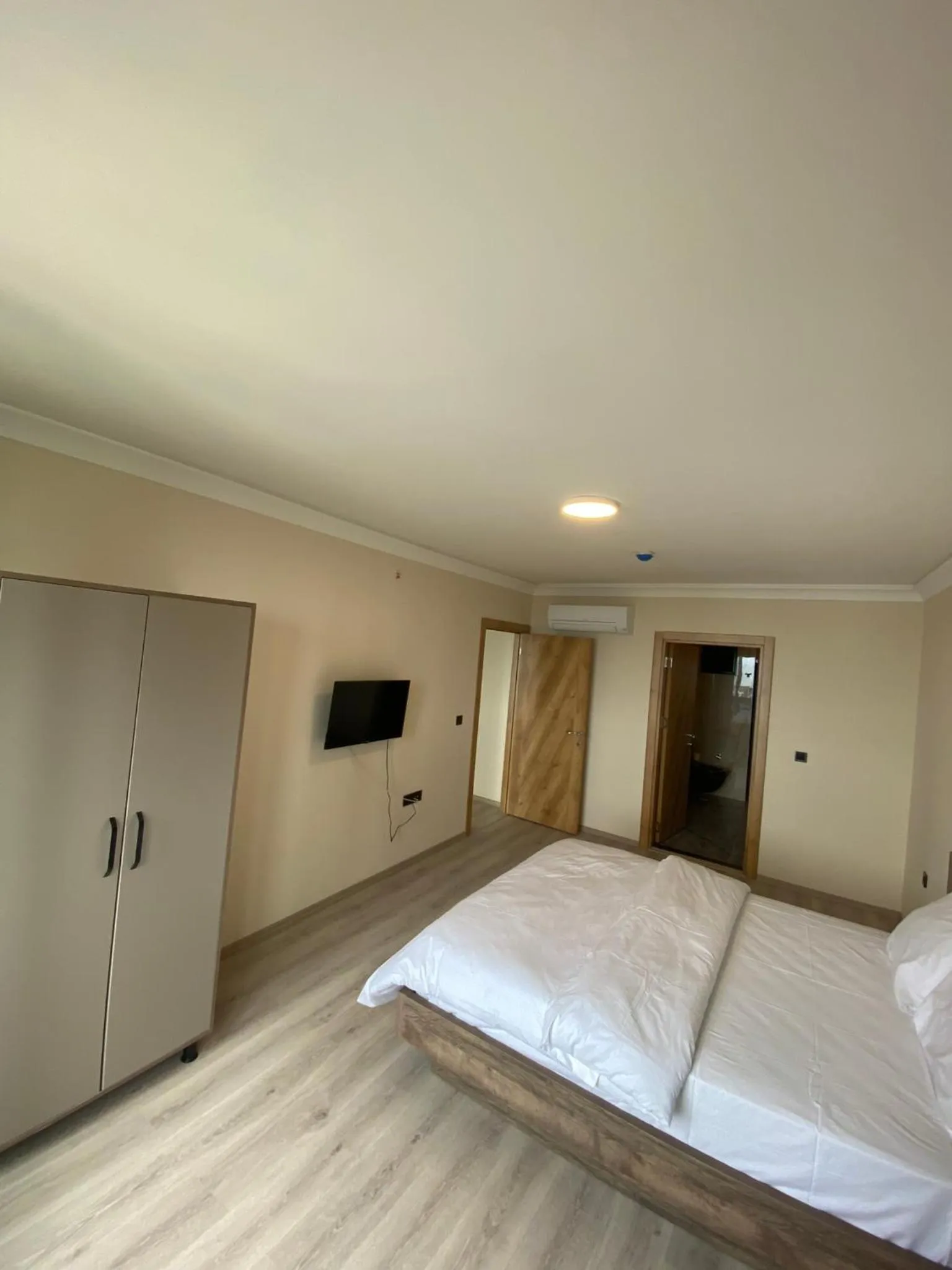 Bed in Rena Grand Residence & Suit