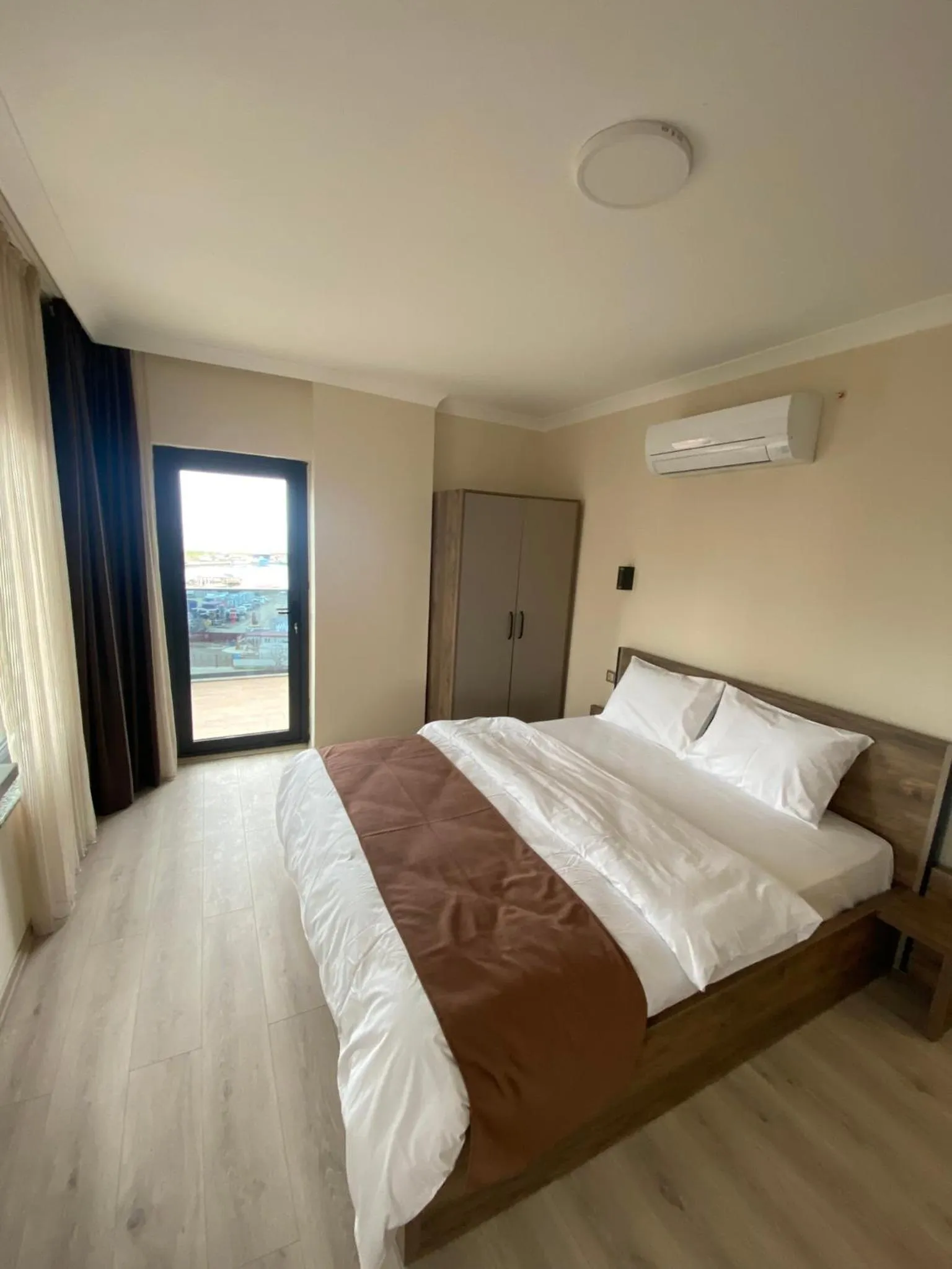 Bed in Rena Grand Residence & Suit