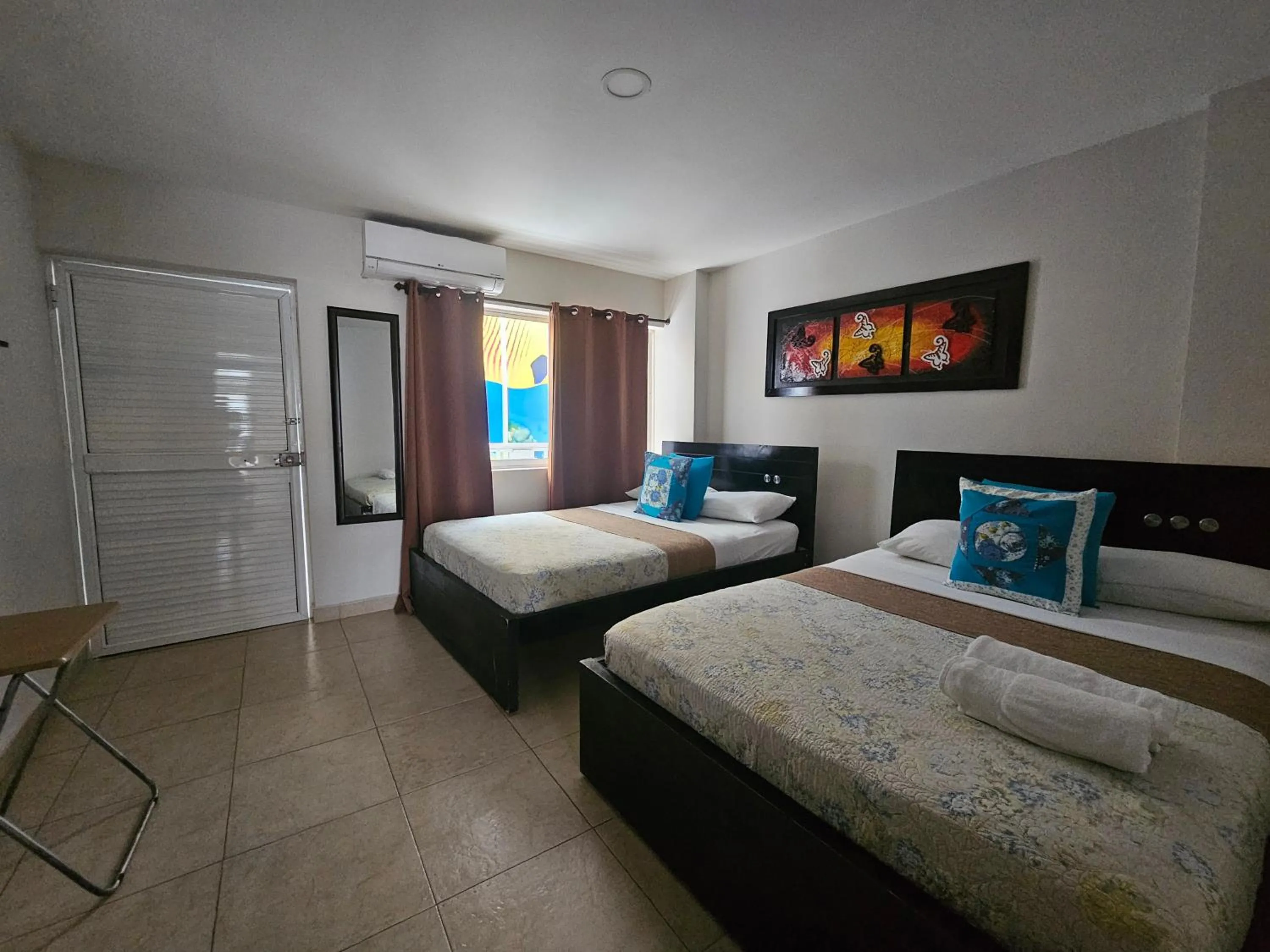 Bed in Caribbean Island Hotel Piso 2