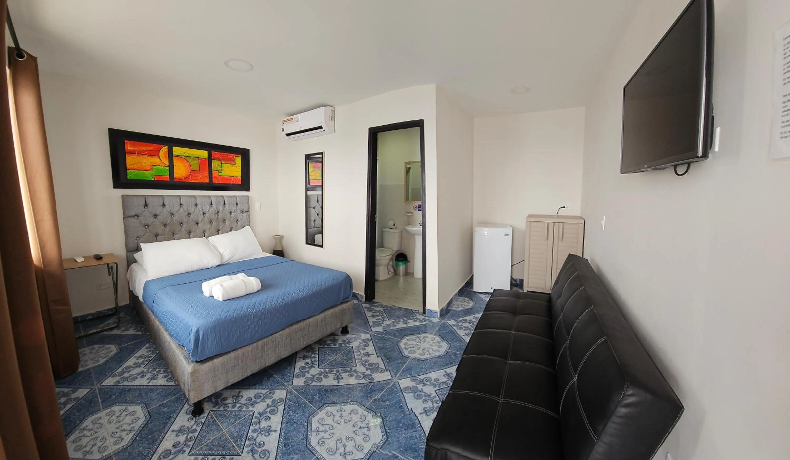 Bed in Caribbean Island Hotel Piso 2