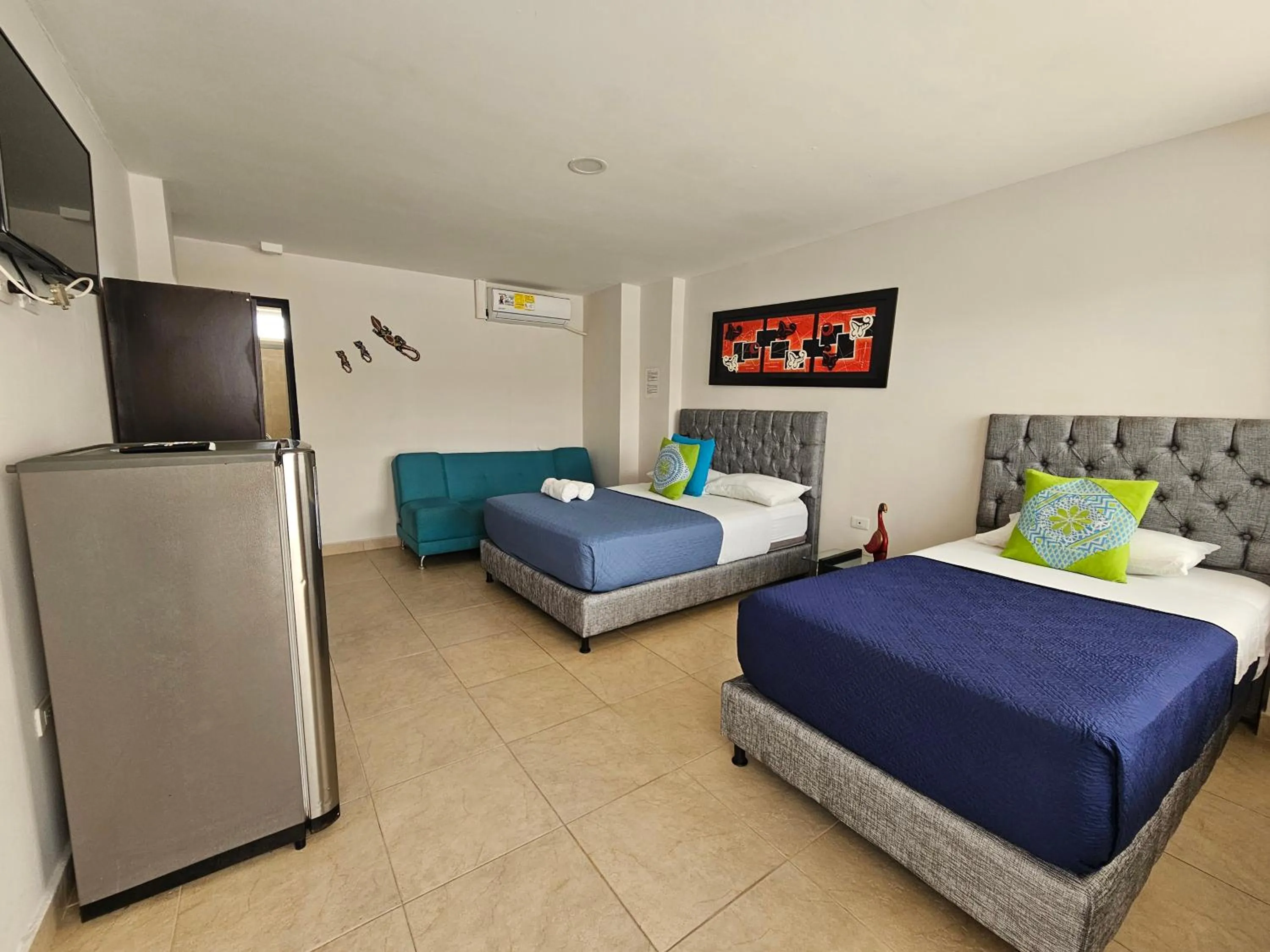 Bed in Caribbean Island Hotel Piso 2