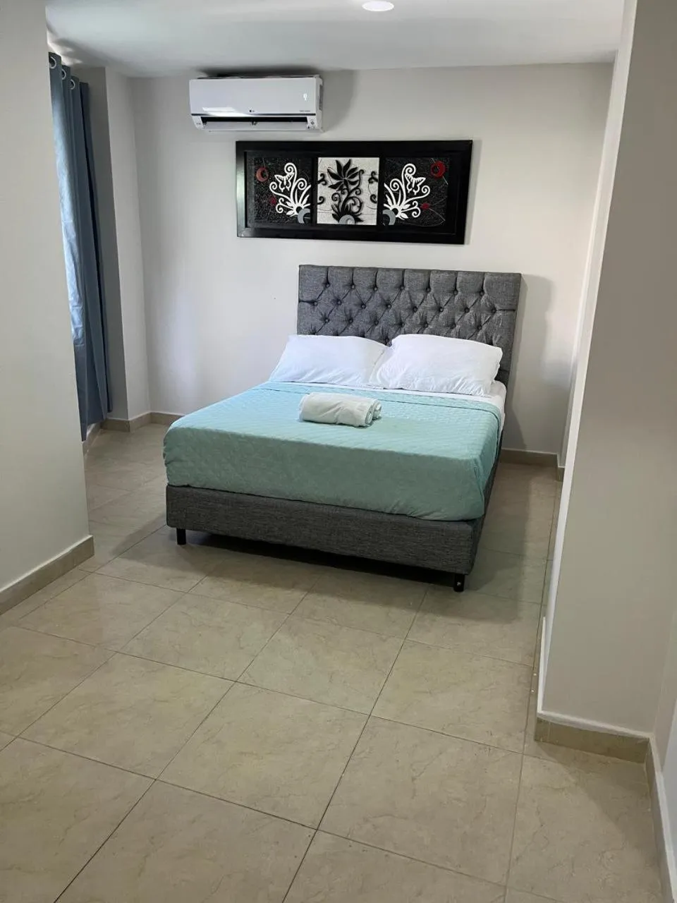 Bed in Caribbean Island Hotel Piso 2