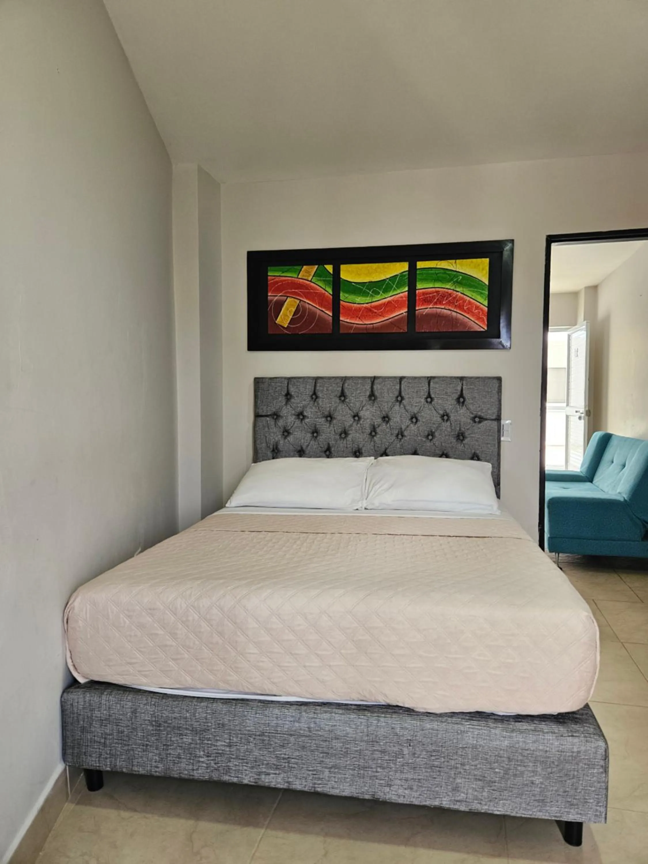 Bed in Caribbean Island Hotel Piso 2