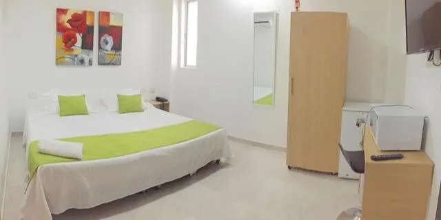 Photo of the whole room in Hotel Calarca Plus