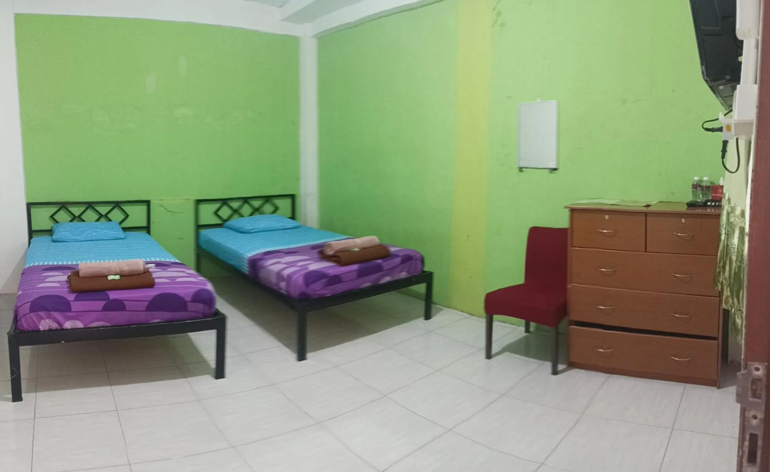 Bed in BOTANIA HOMESTAY BATAM