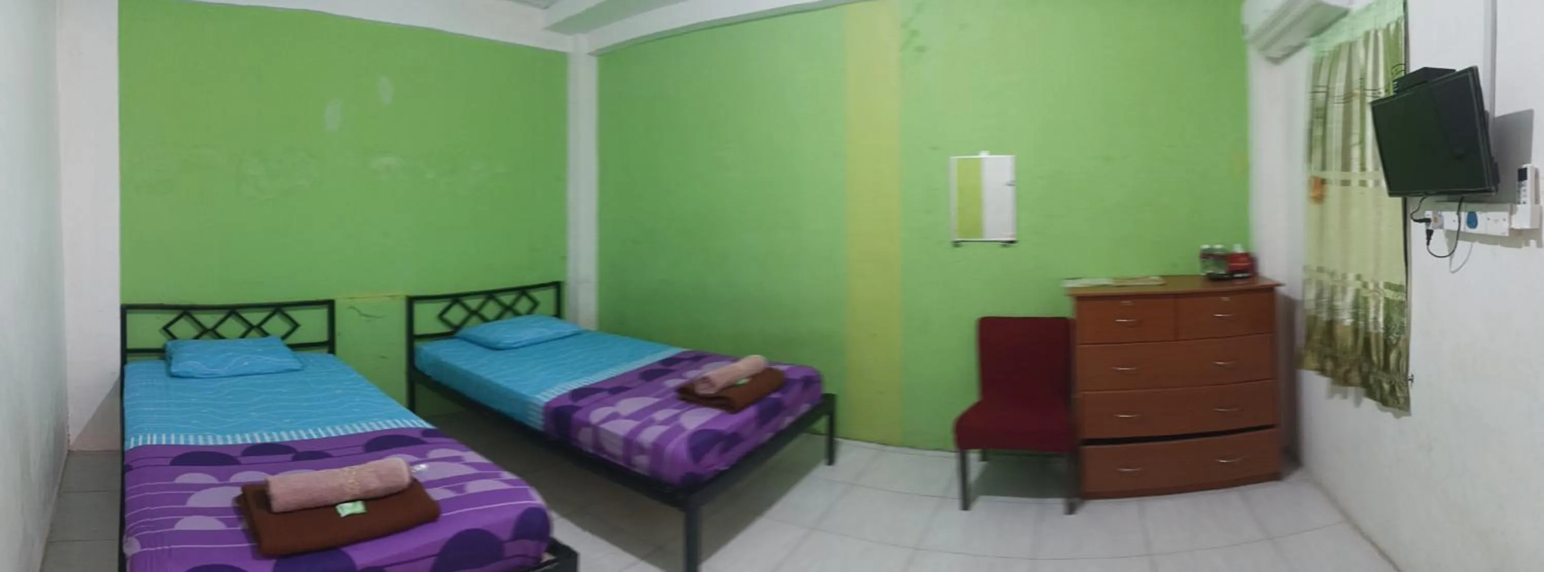 Bed in BOTANIA HOMESTAY BATAM