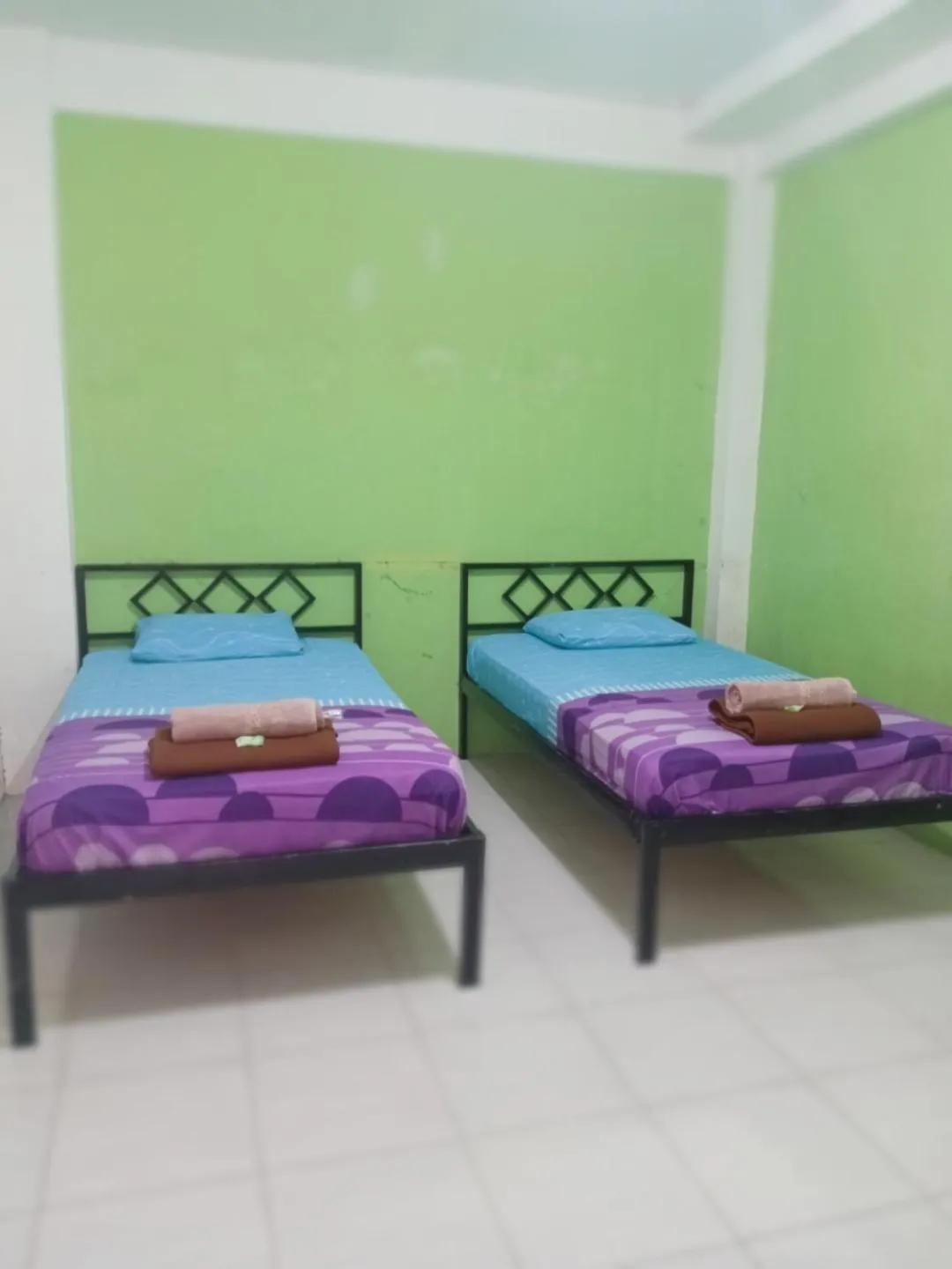 Bed in BOTANIA HOMESTAY BATAM