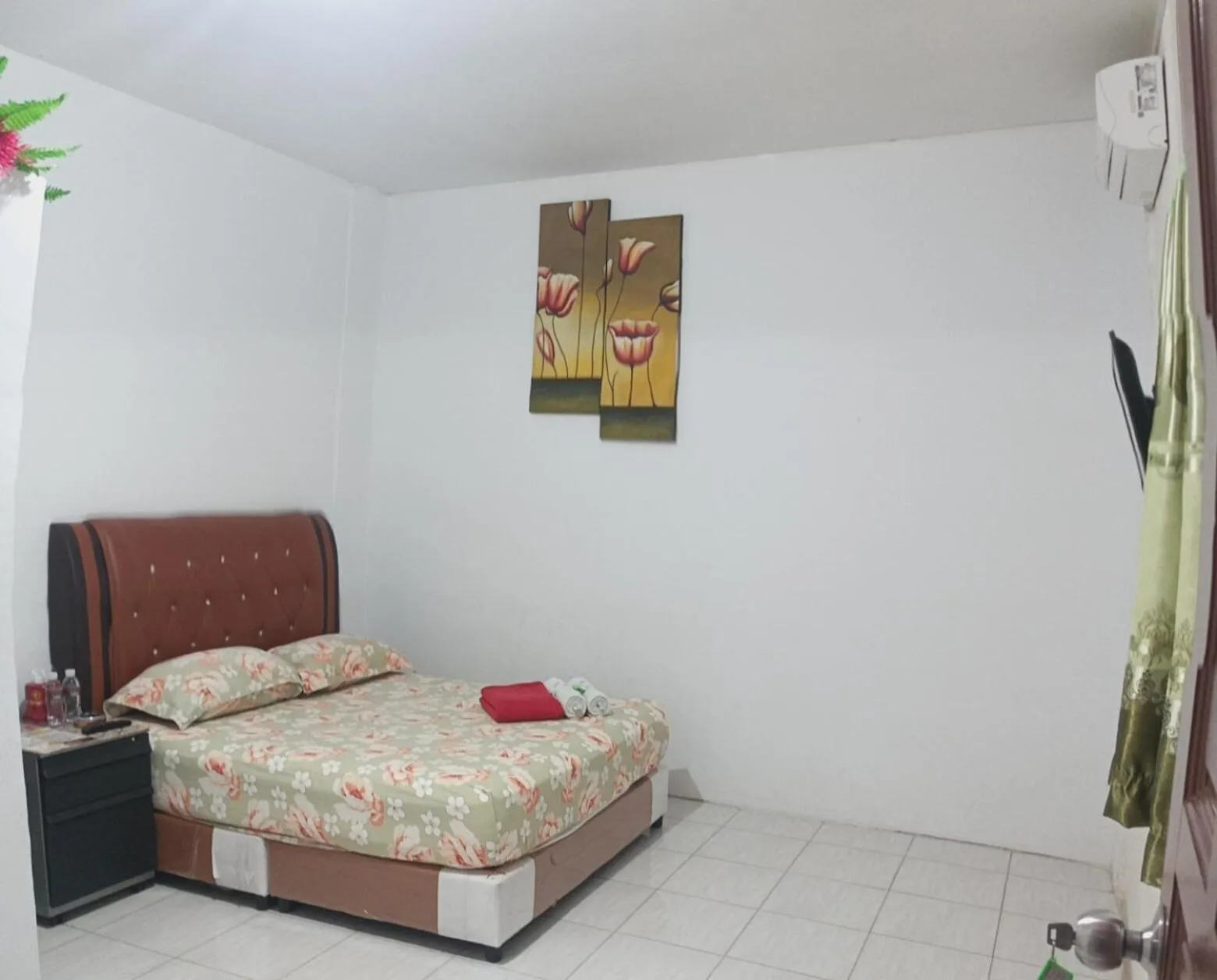 Bed in BOTANIA HOMESTAY BATAM