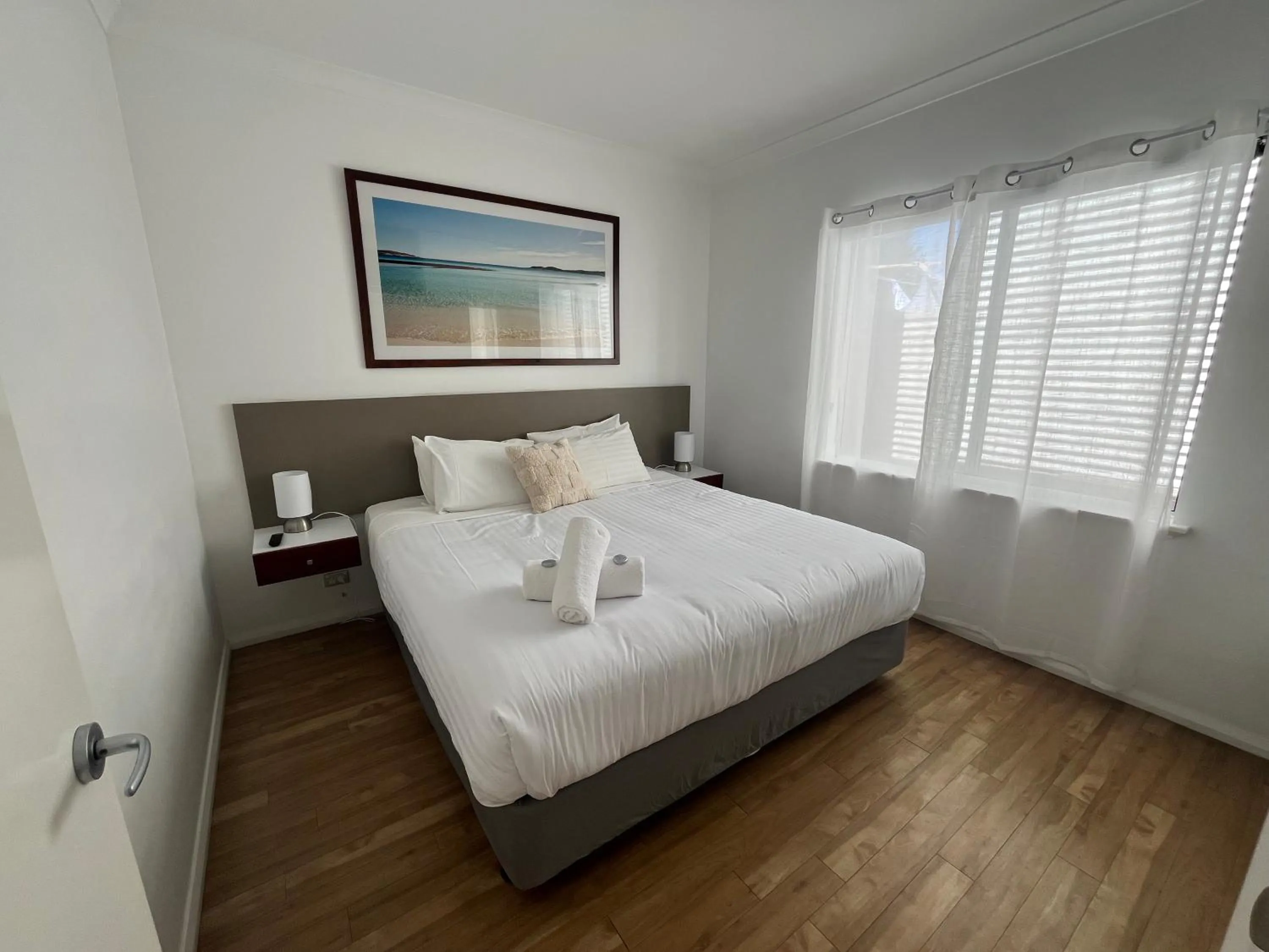 Bed in Clearwater Motel Apartments