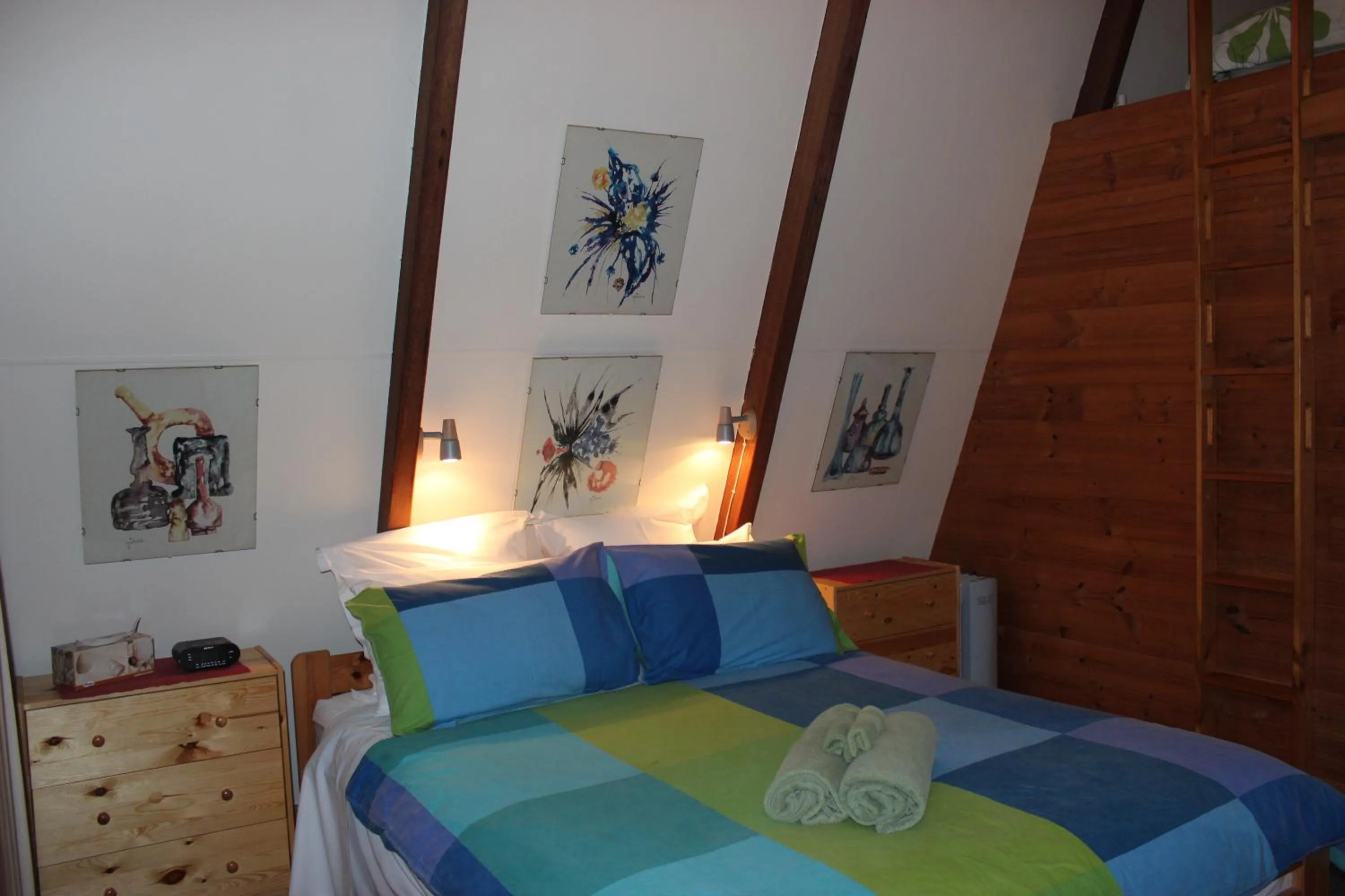 Bed in Green Leaves Cabin